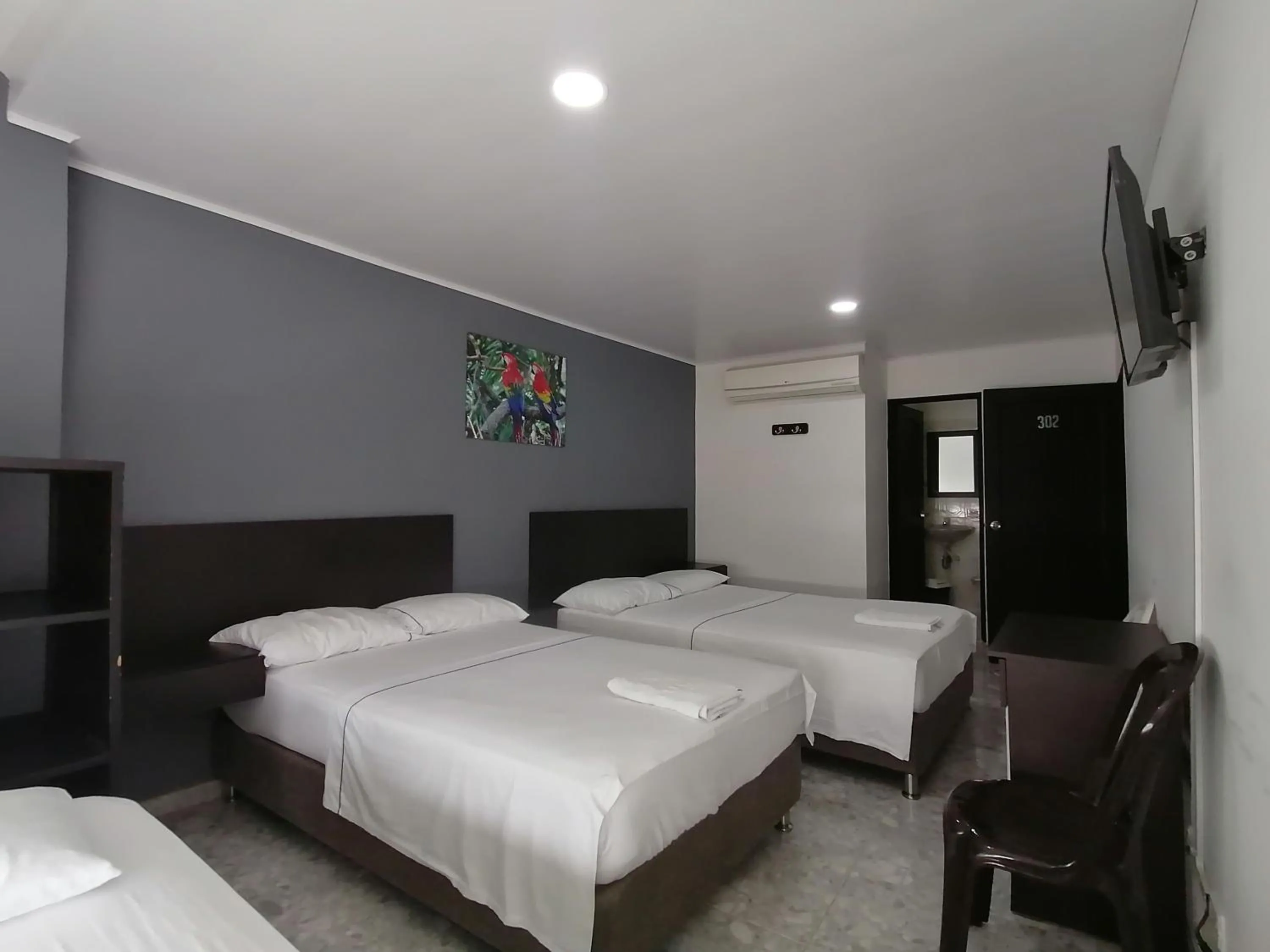 Bed in Hotel Bucare