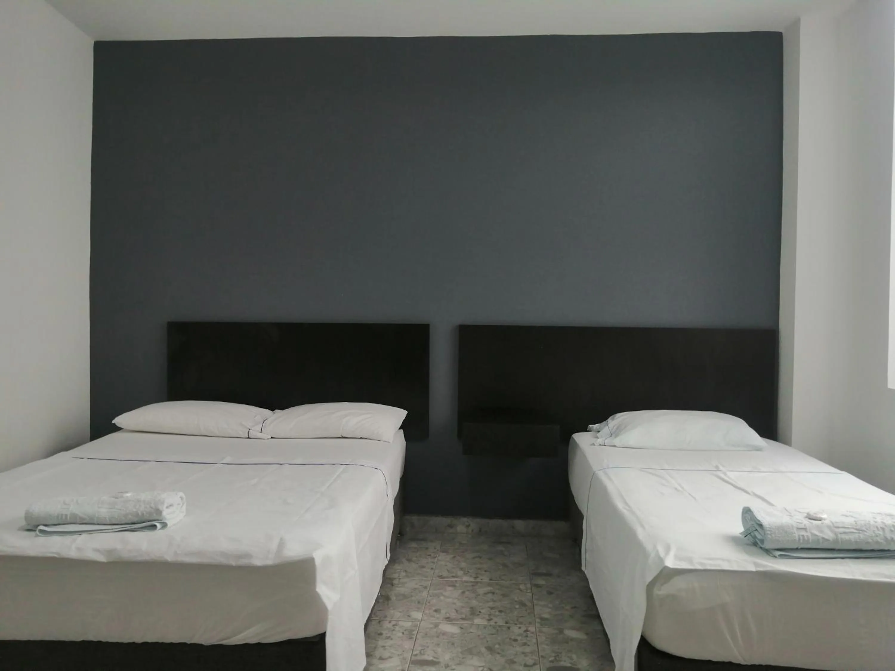 Bed in Hotel Bucare