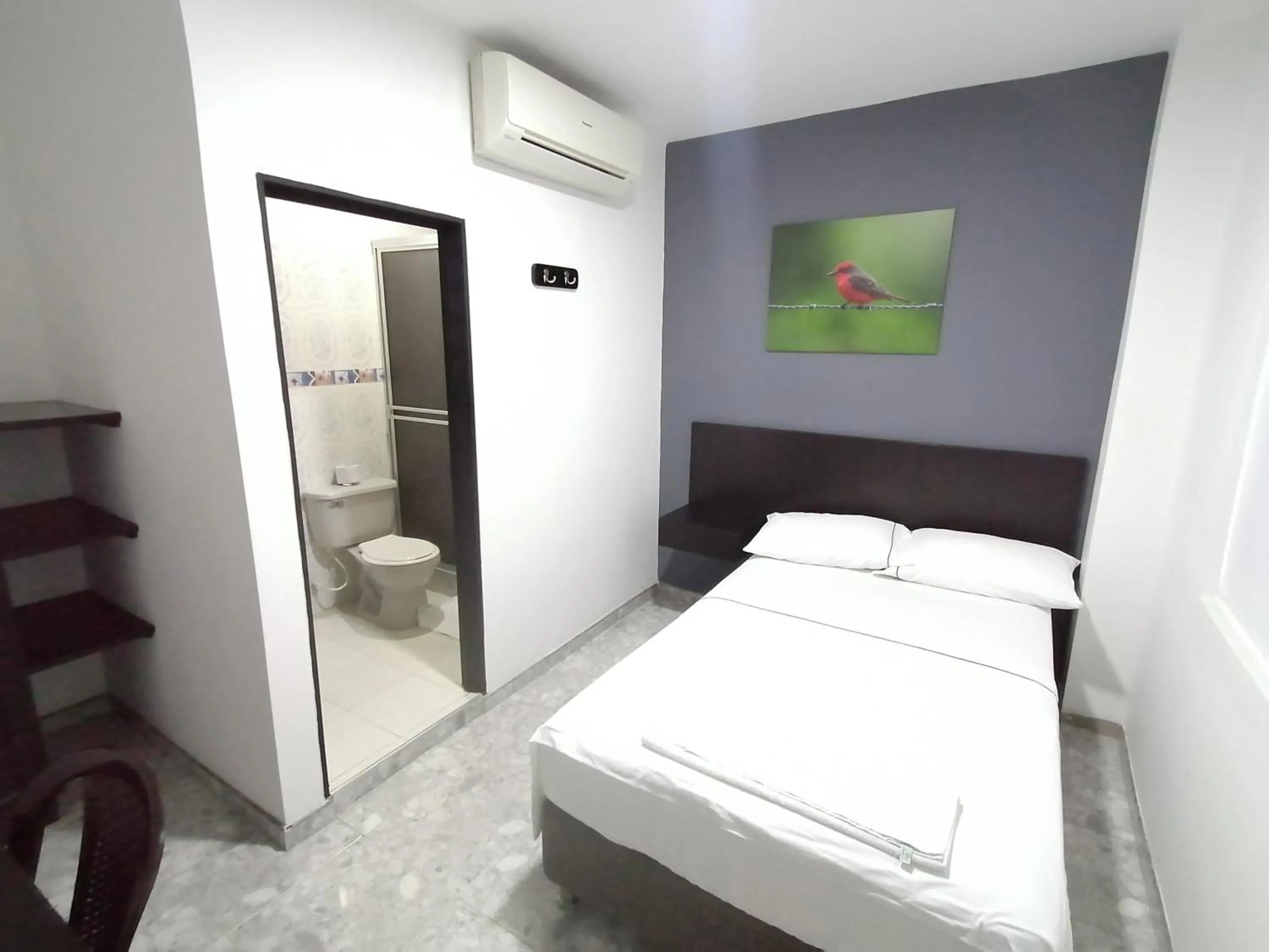 Bed in Hotel Bucare
