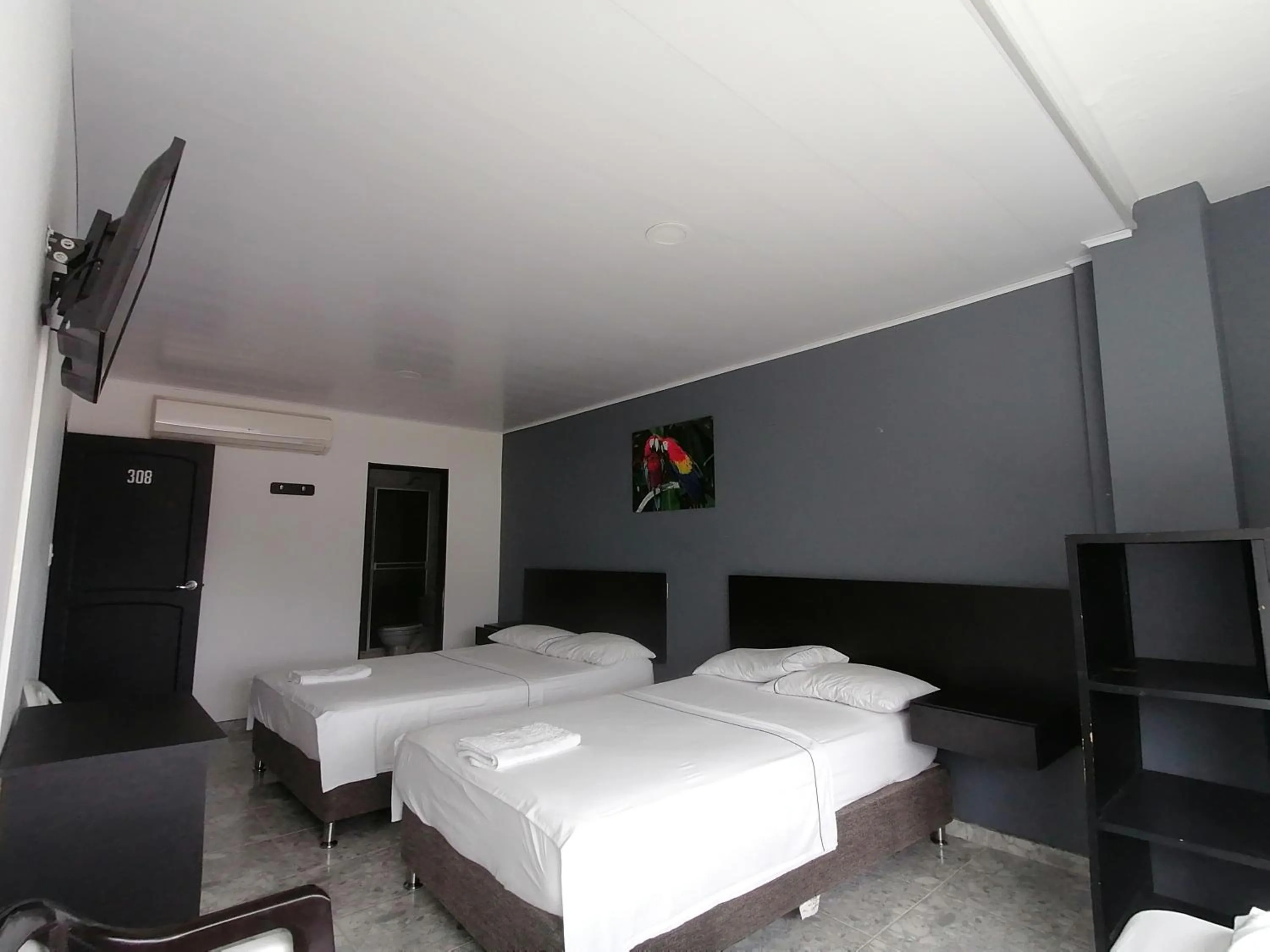 Bed in Hotel Bucare