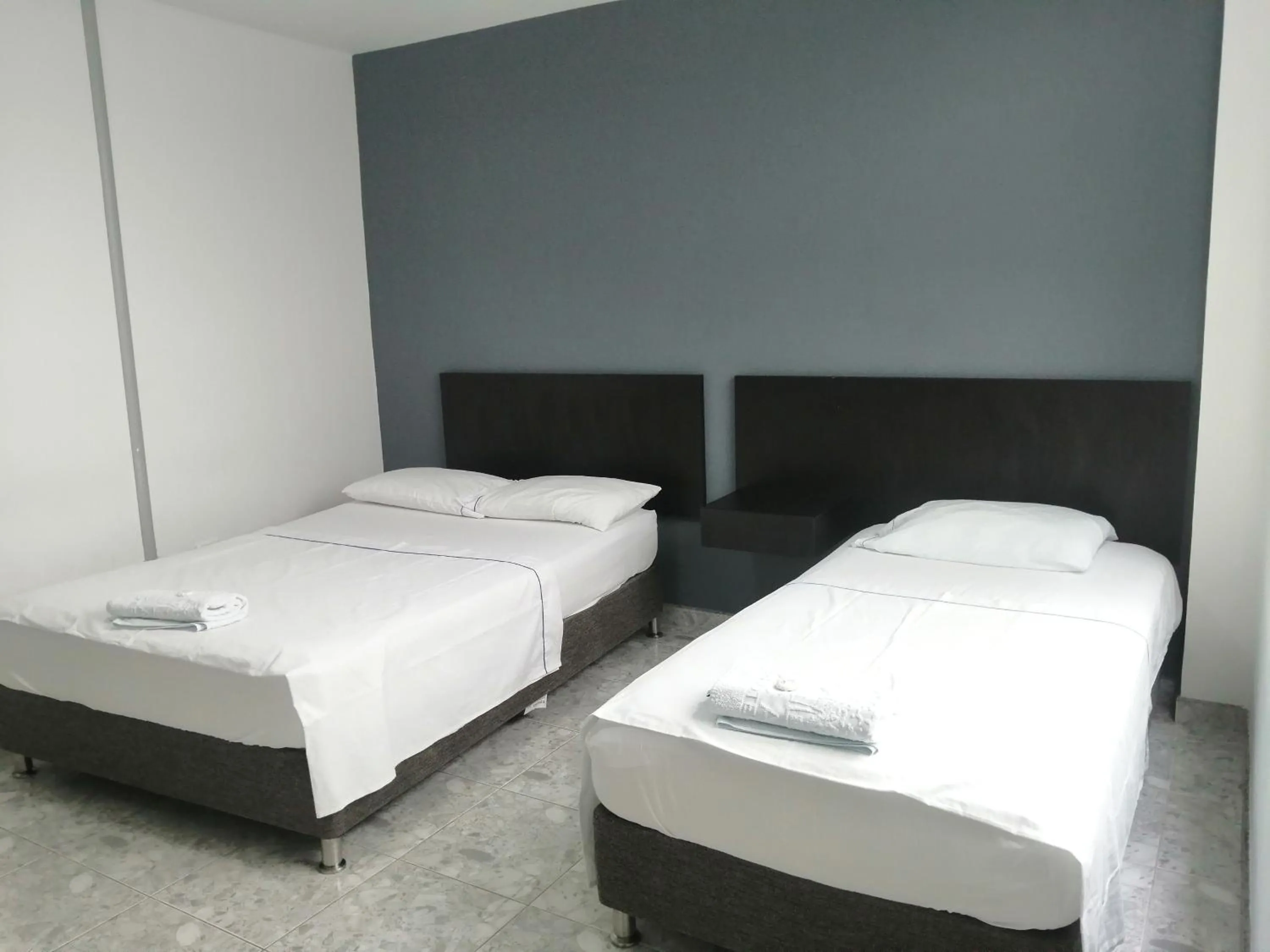 Bed in Hotel Bucare