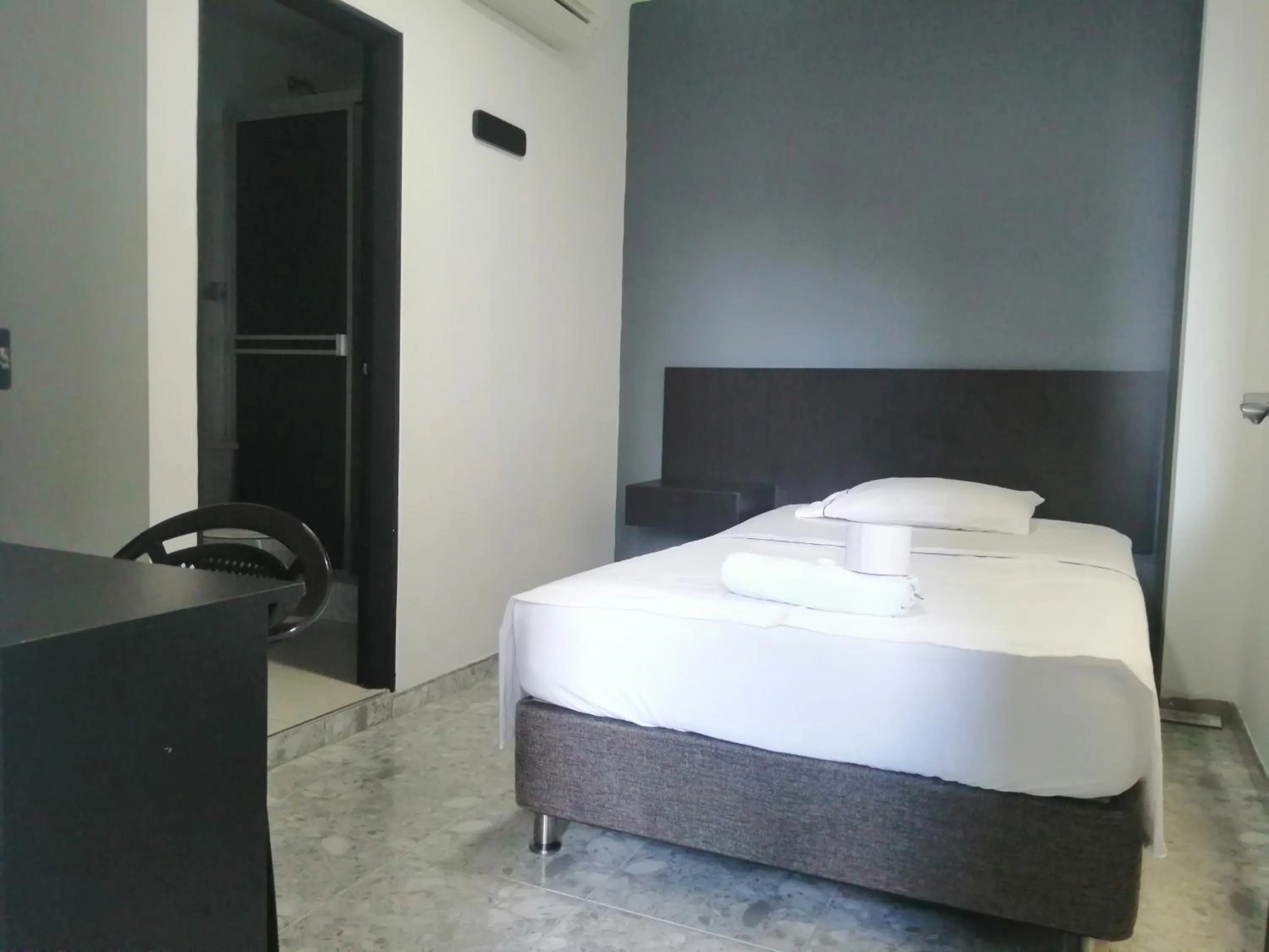 Bed in Hotel Bucare