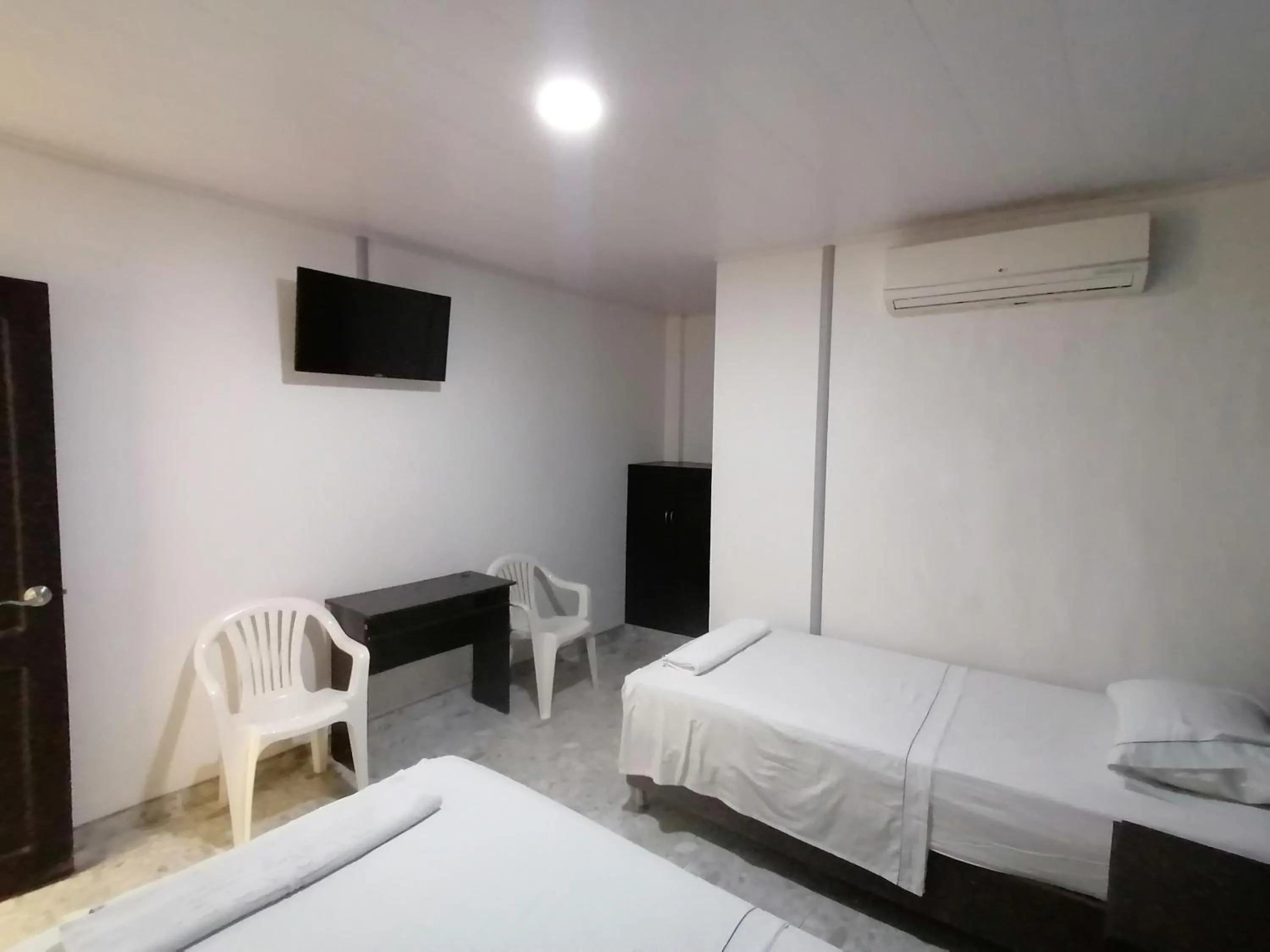 Bed in Hotel Bucare