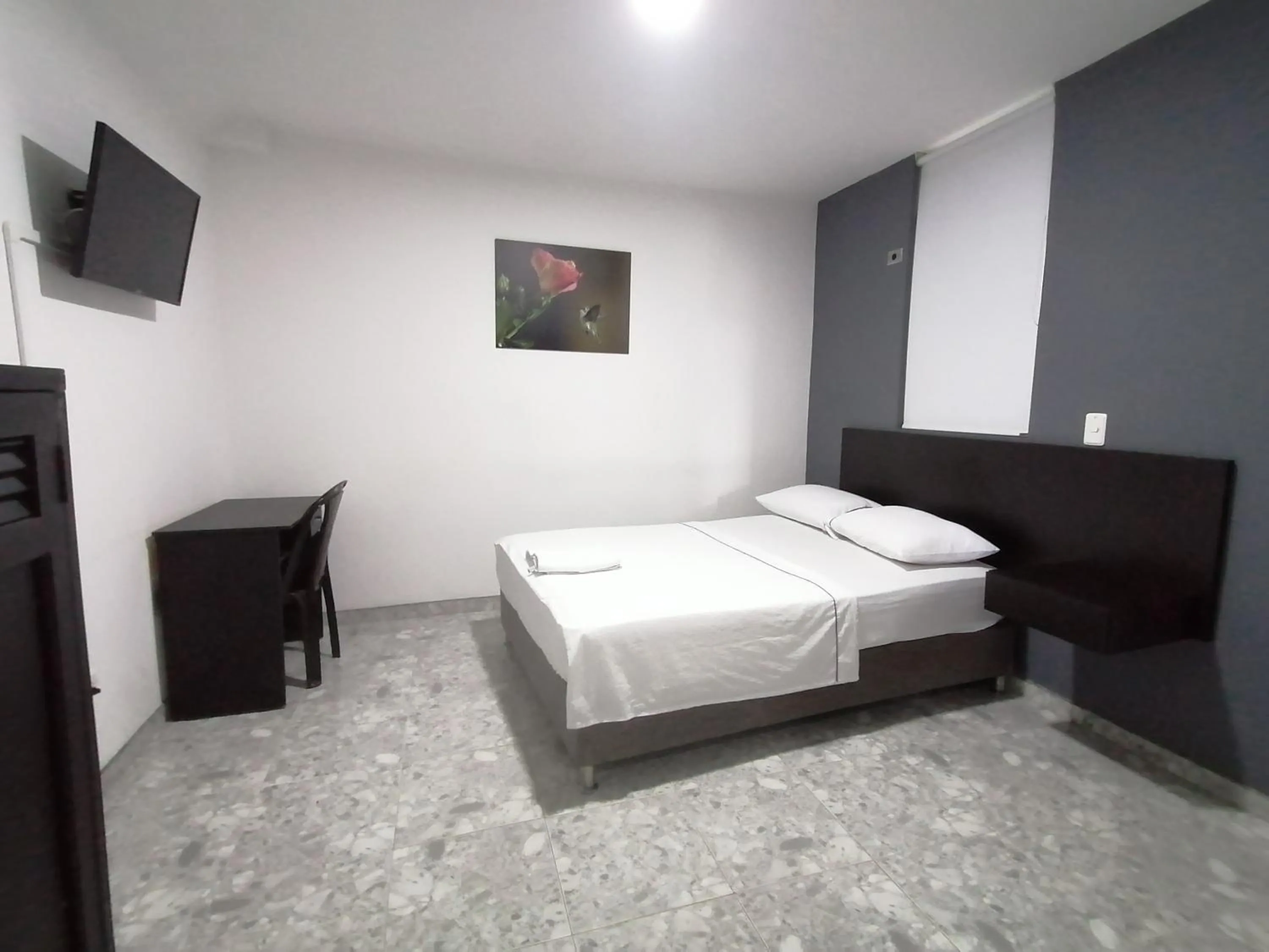 Bed in Hotel Bucare