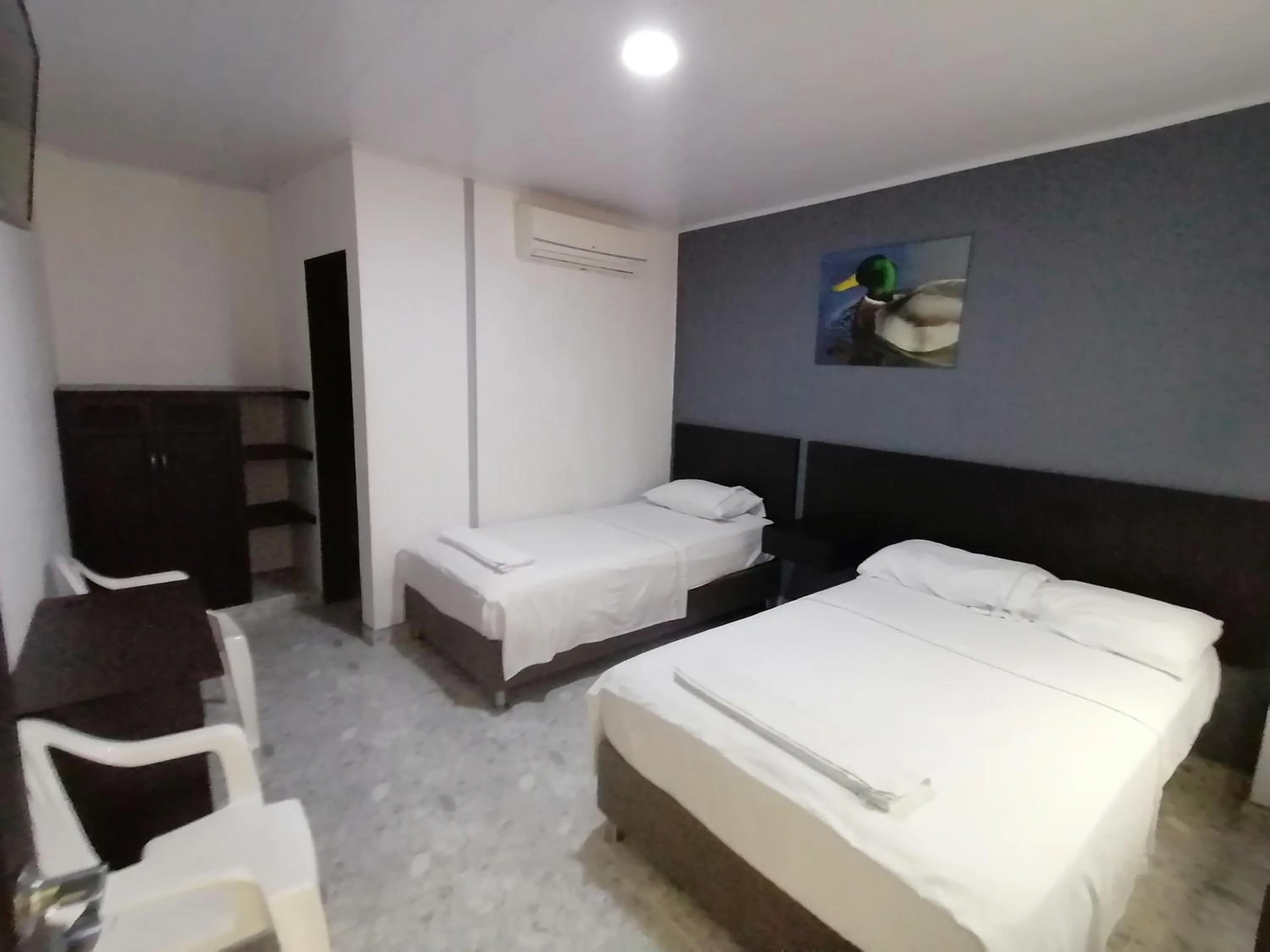 Bed in Hotel Bucare