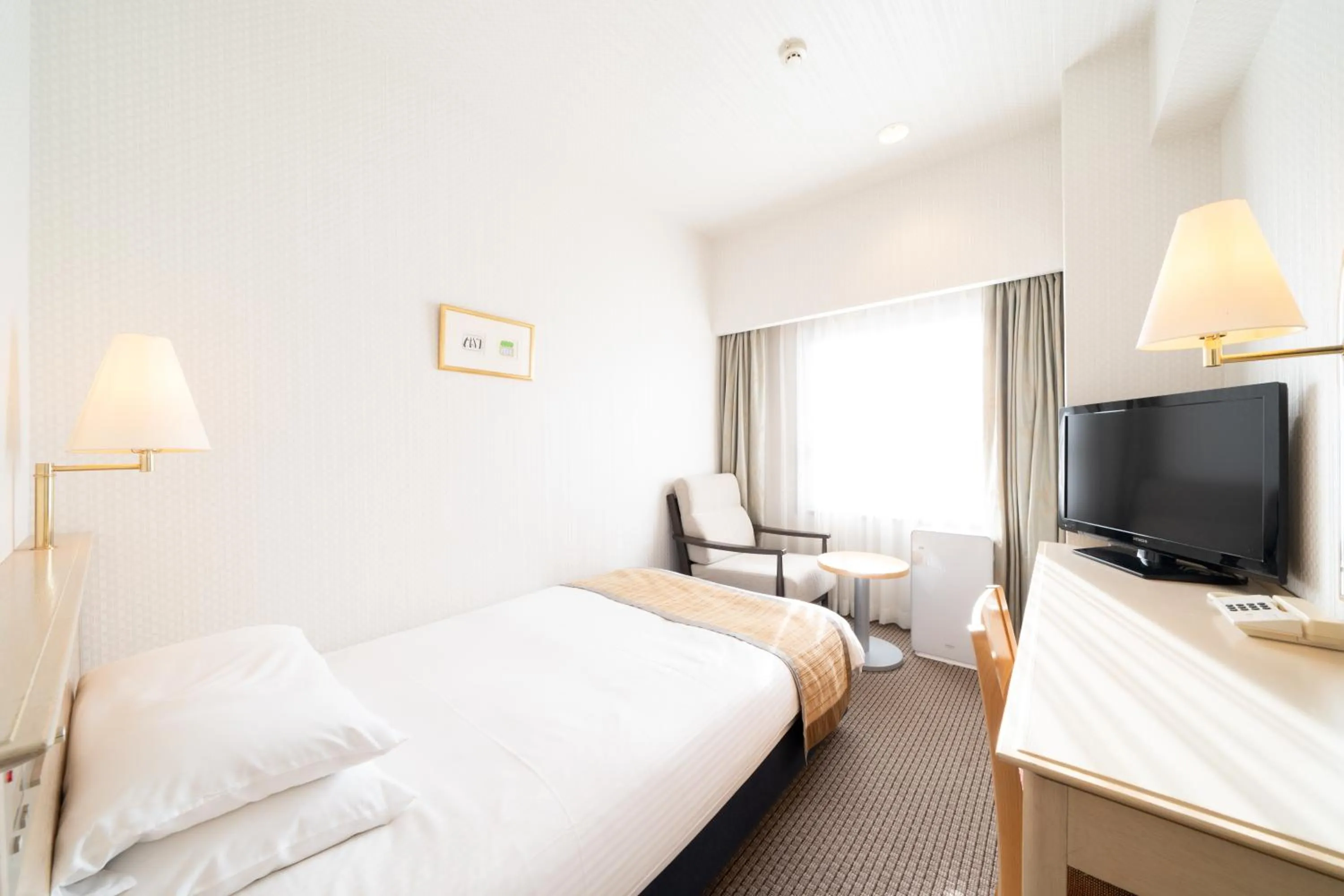 Bed in Hotel Terrace The Square Hitachi