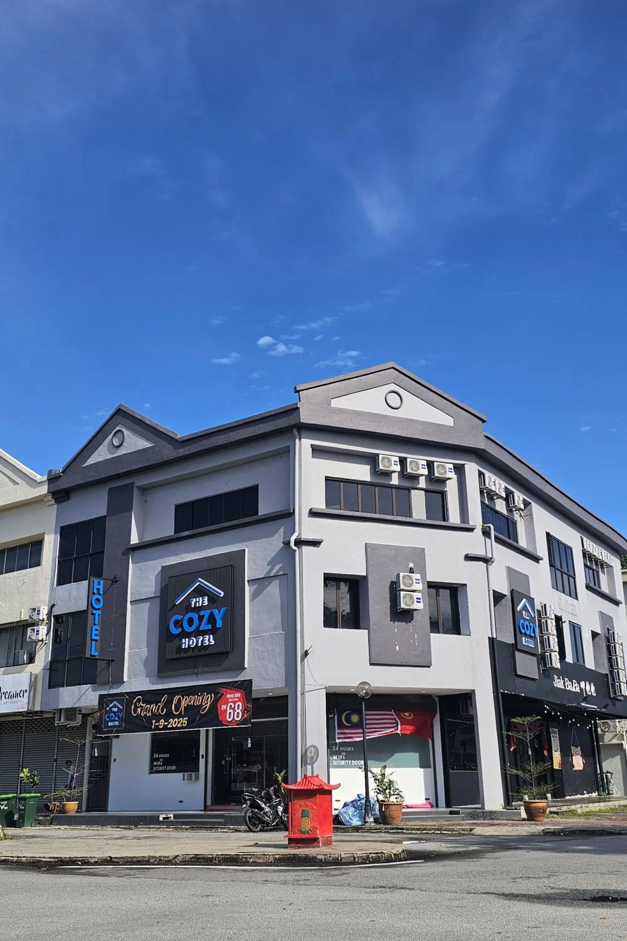 Property building in The Cozy Hotel