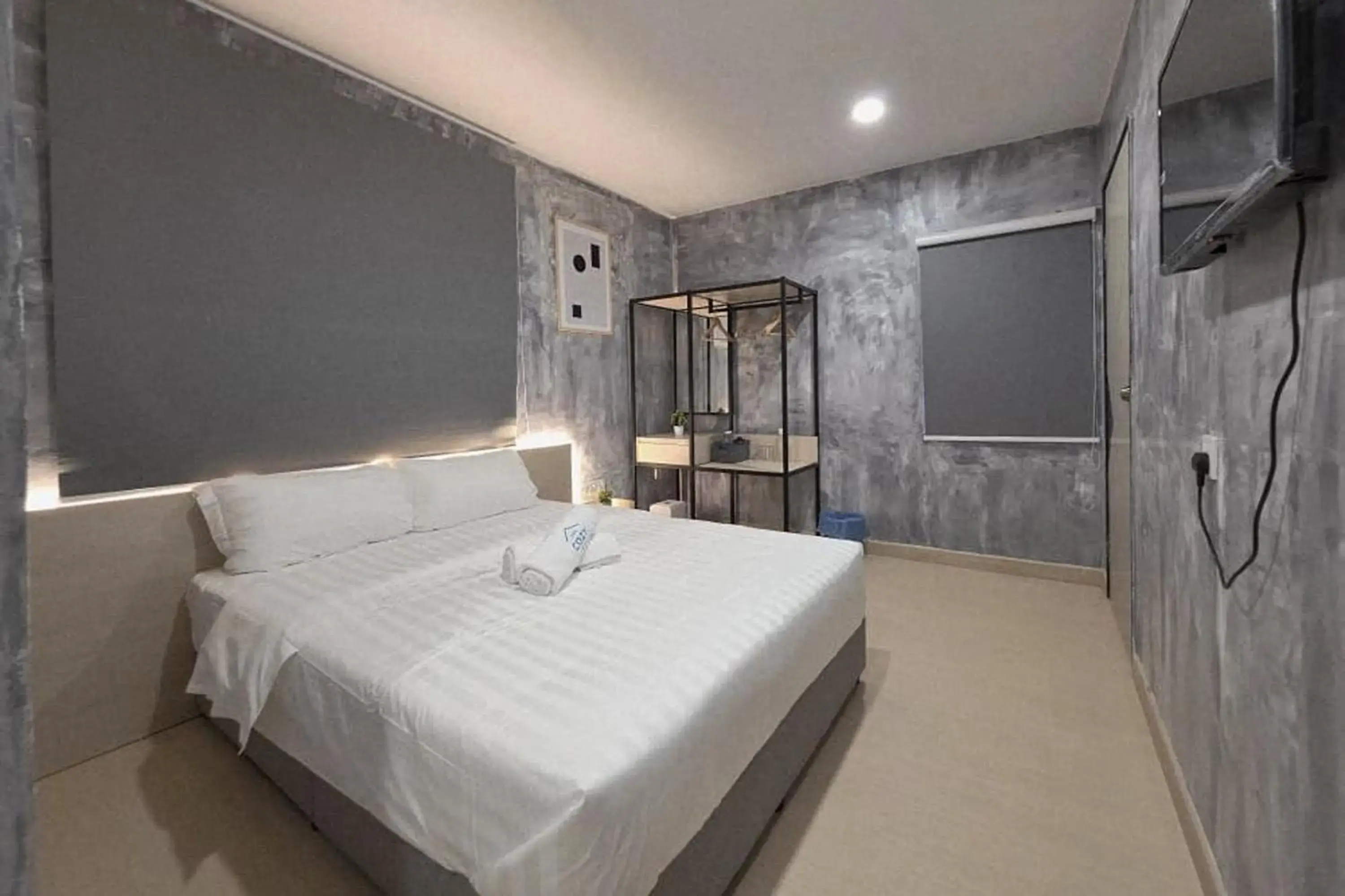 Bed in The Cozy Hotel Bed in The Cozy Hotel