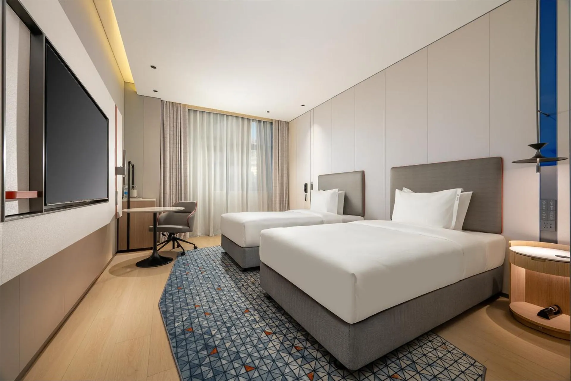 Bed in Holiday Inn Express Shenzhen Sports Center by IHG