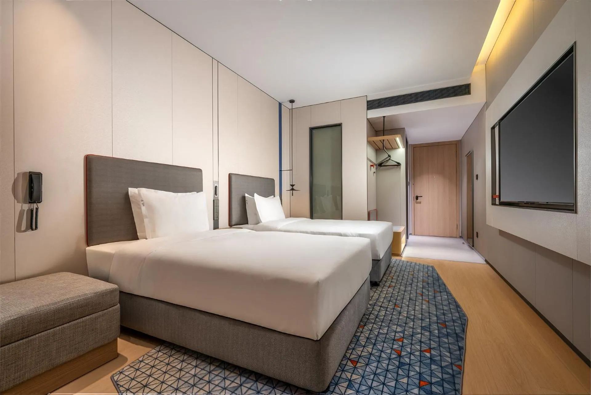 Photo of the whole room, Bed in Holiday Inn Express Shenzhen Sports Center by IHG