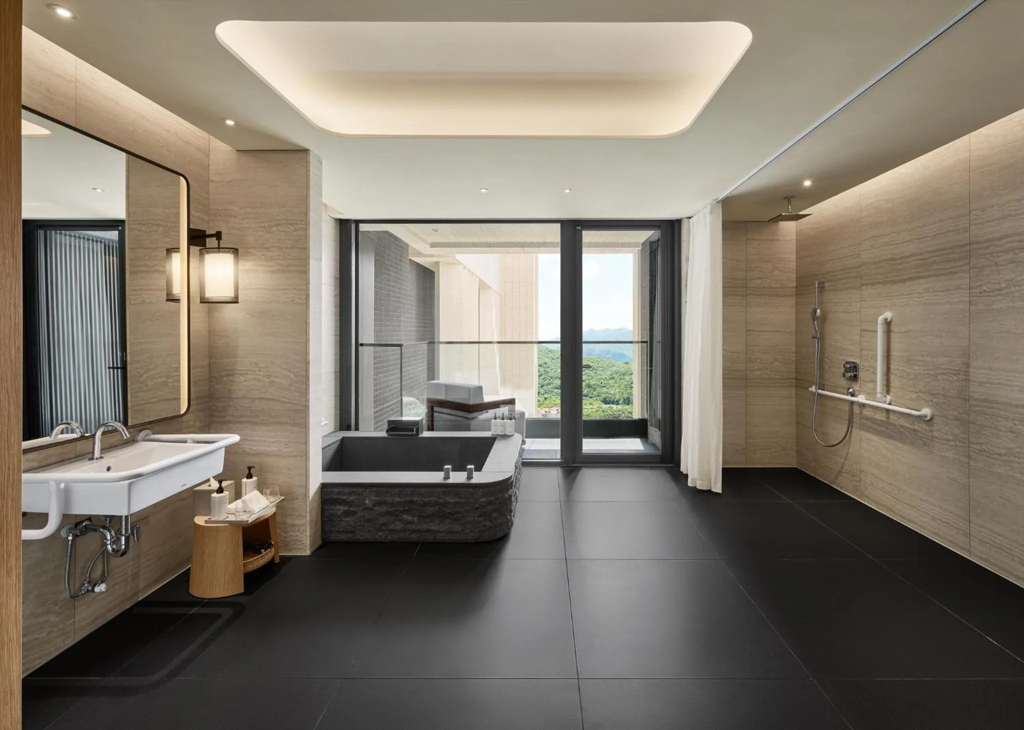 Bathroom in InterContinental Hotels New Taipei Hot Spring by IHG