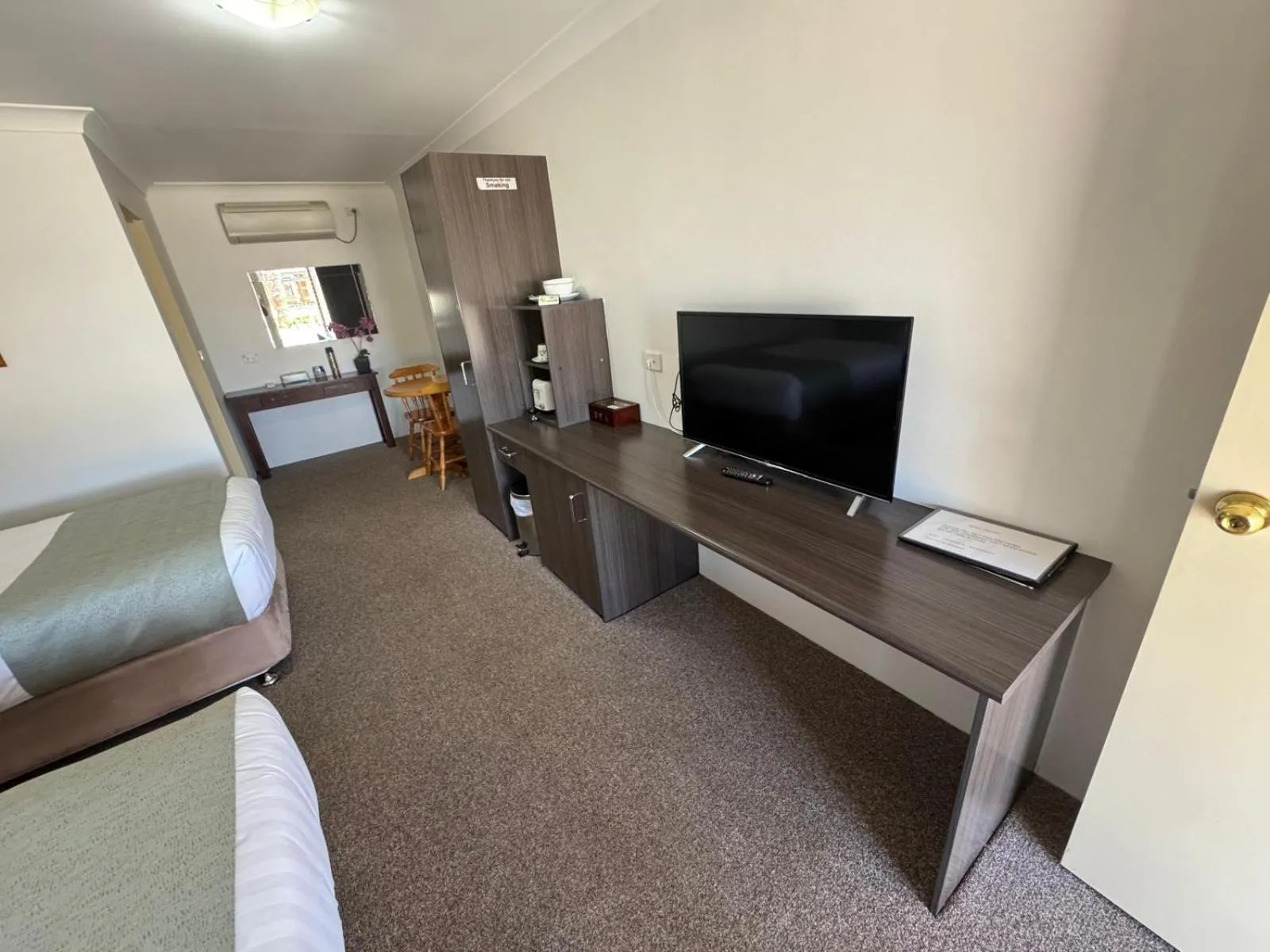 Bed in Marulan Motor Inn