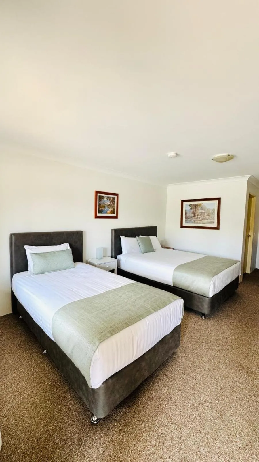 Bed in Marulan Motor Inn