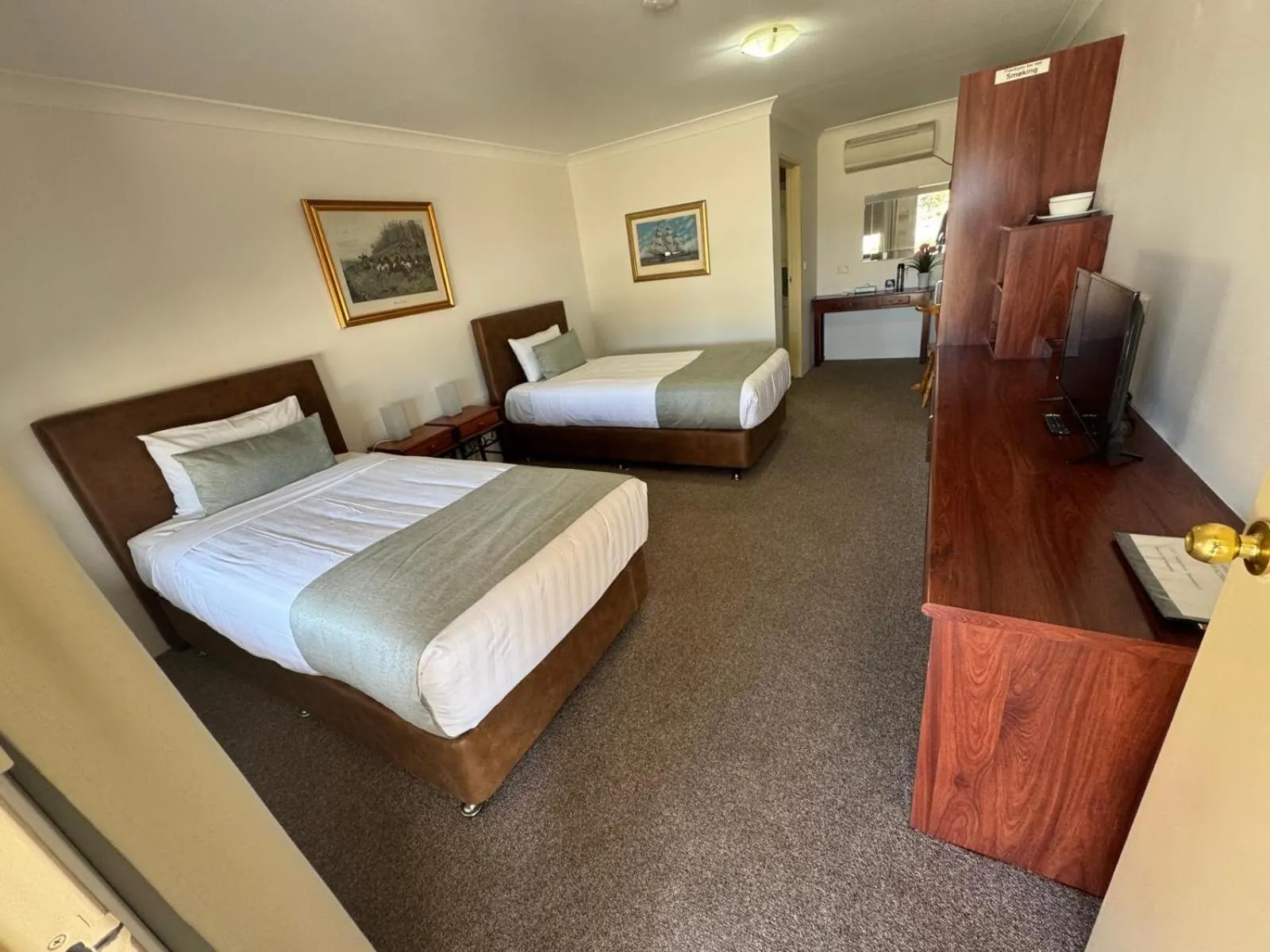 Bed in Marulan Motor Inn