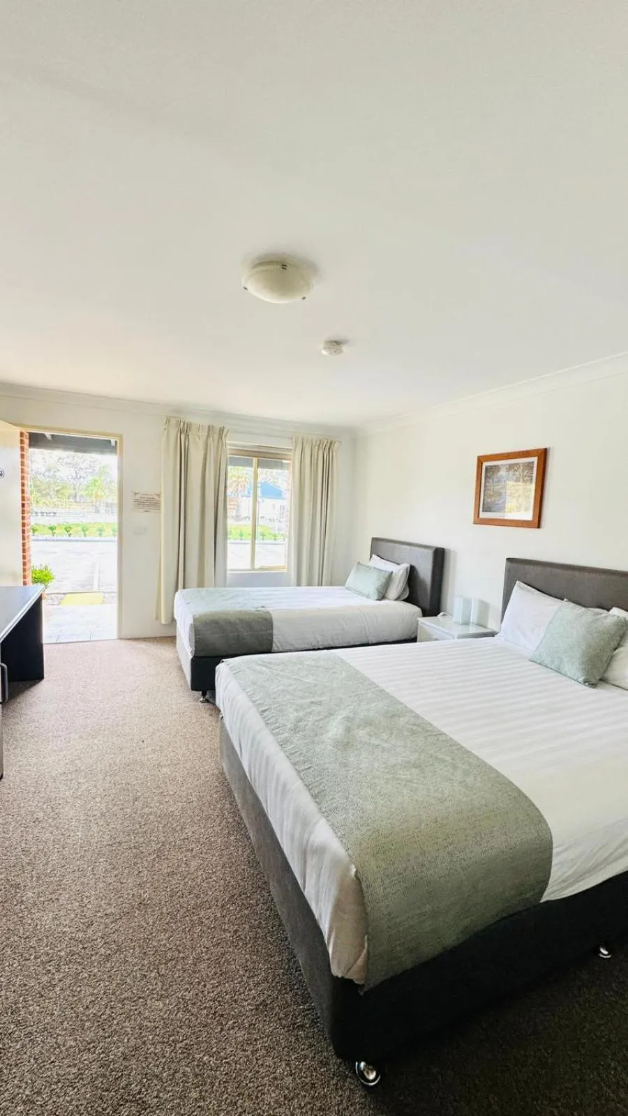 Bed in Marulan Motor Inn