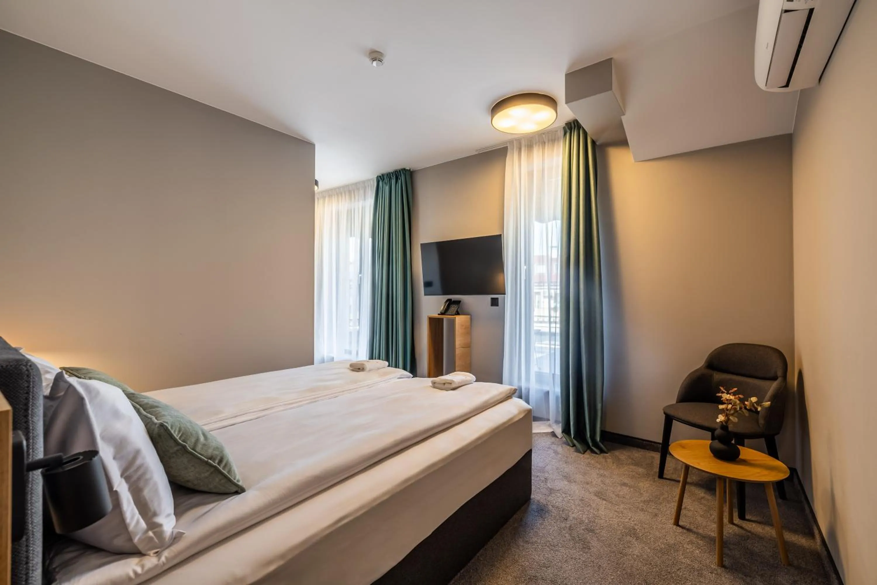 Bed in Acacia Hotel