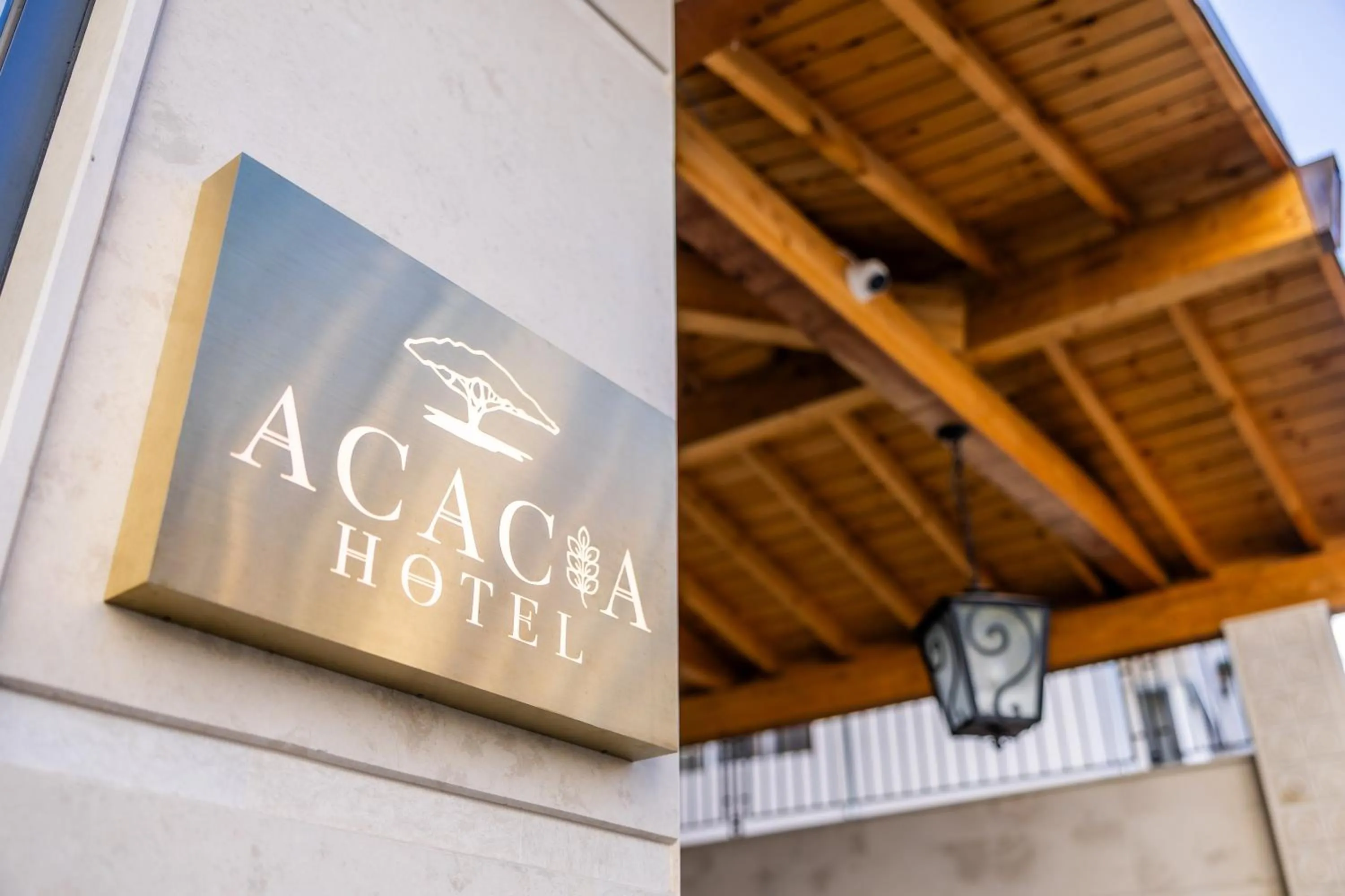 Property logo or sign in Acacia Hotel