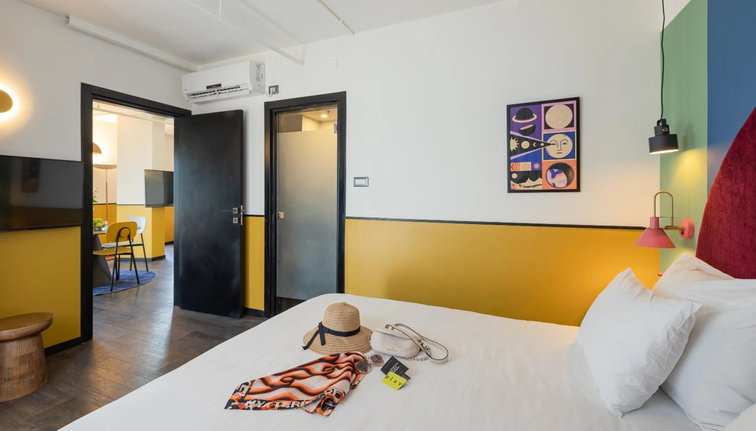 Bed in PLAY Seaport Suite Hotel TLV