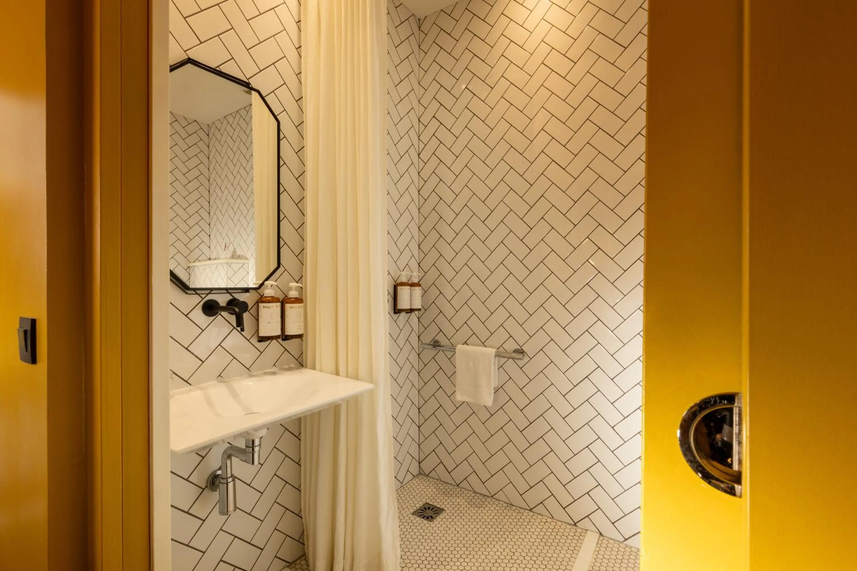 Bathroom in COQ Hotel Paris