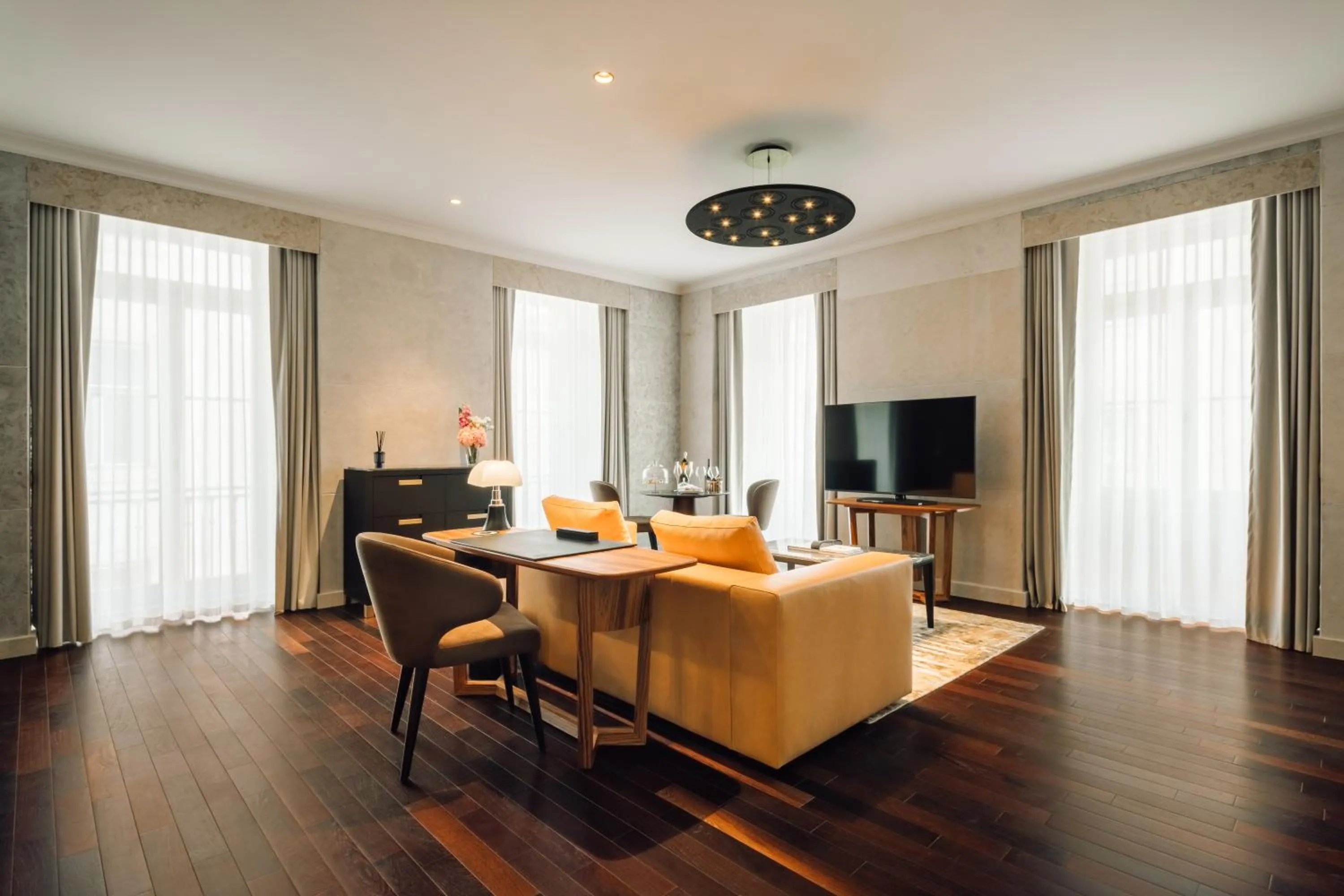 Seating area in MYTHIC SANA Downtown Suites