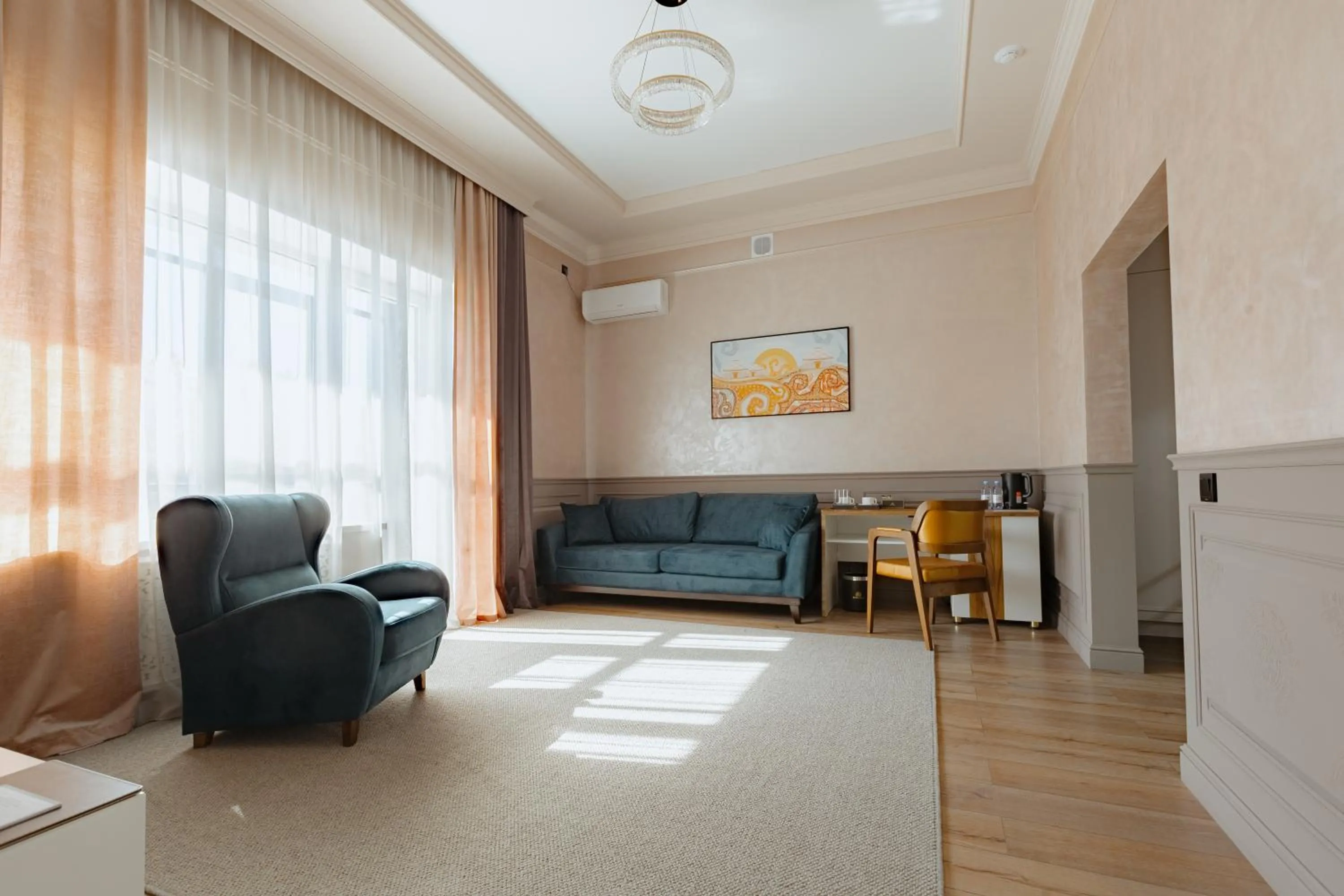 Living room in Beibarys Hotel