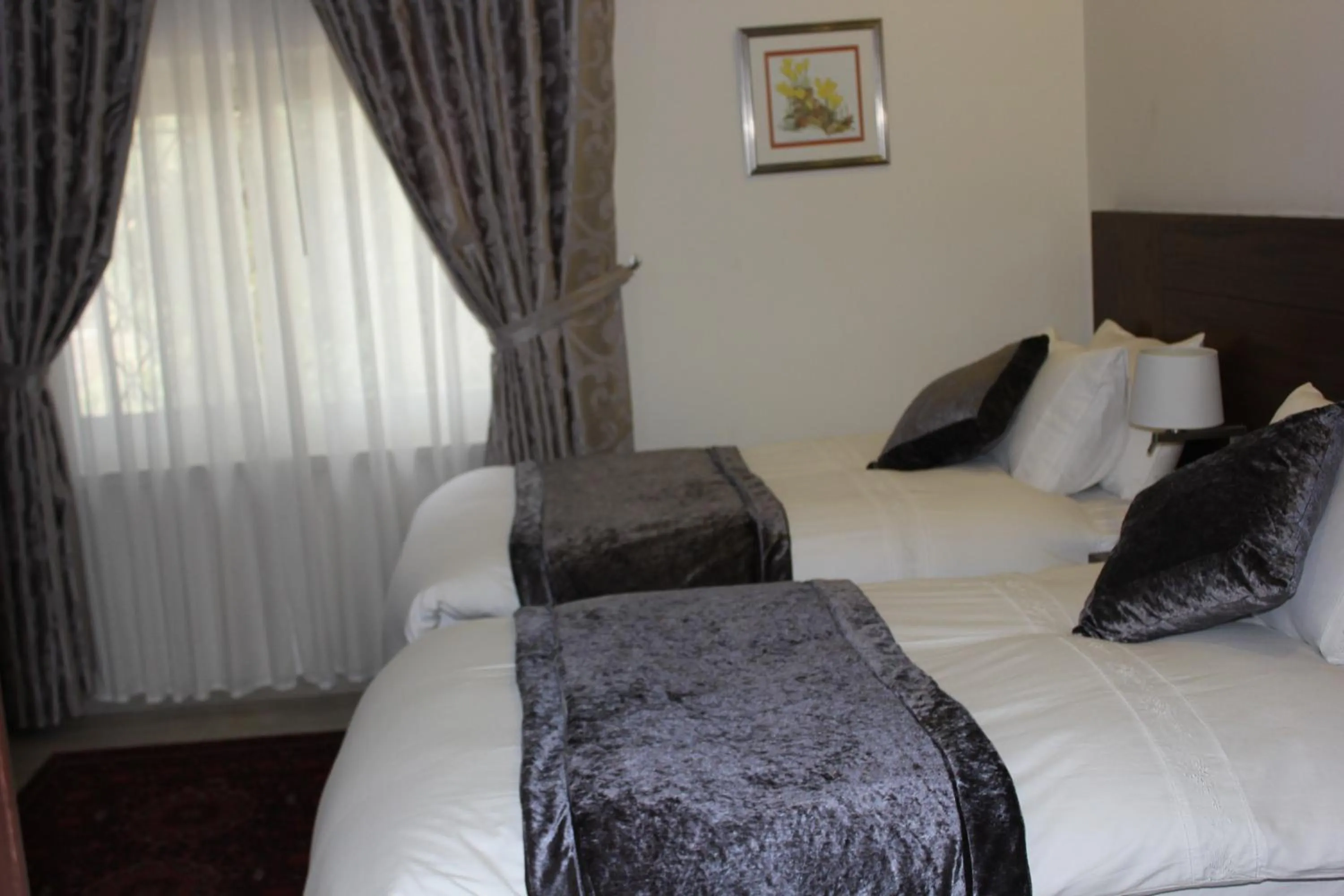 Bed in Lavender Boutique Hotel