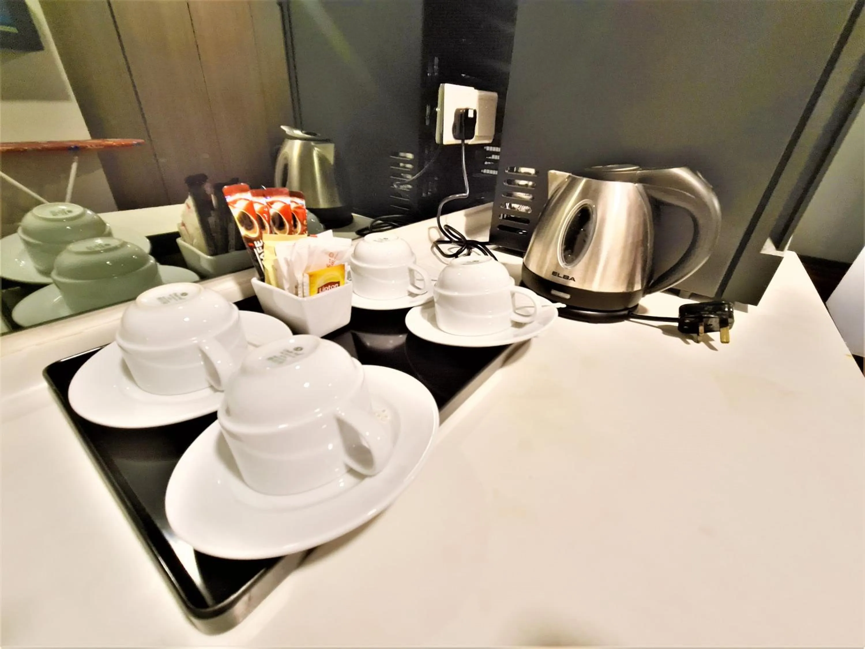 Coffee/tea facilities in Nexus Business Suite Hotel