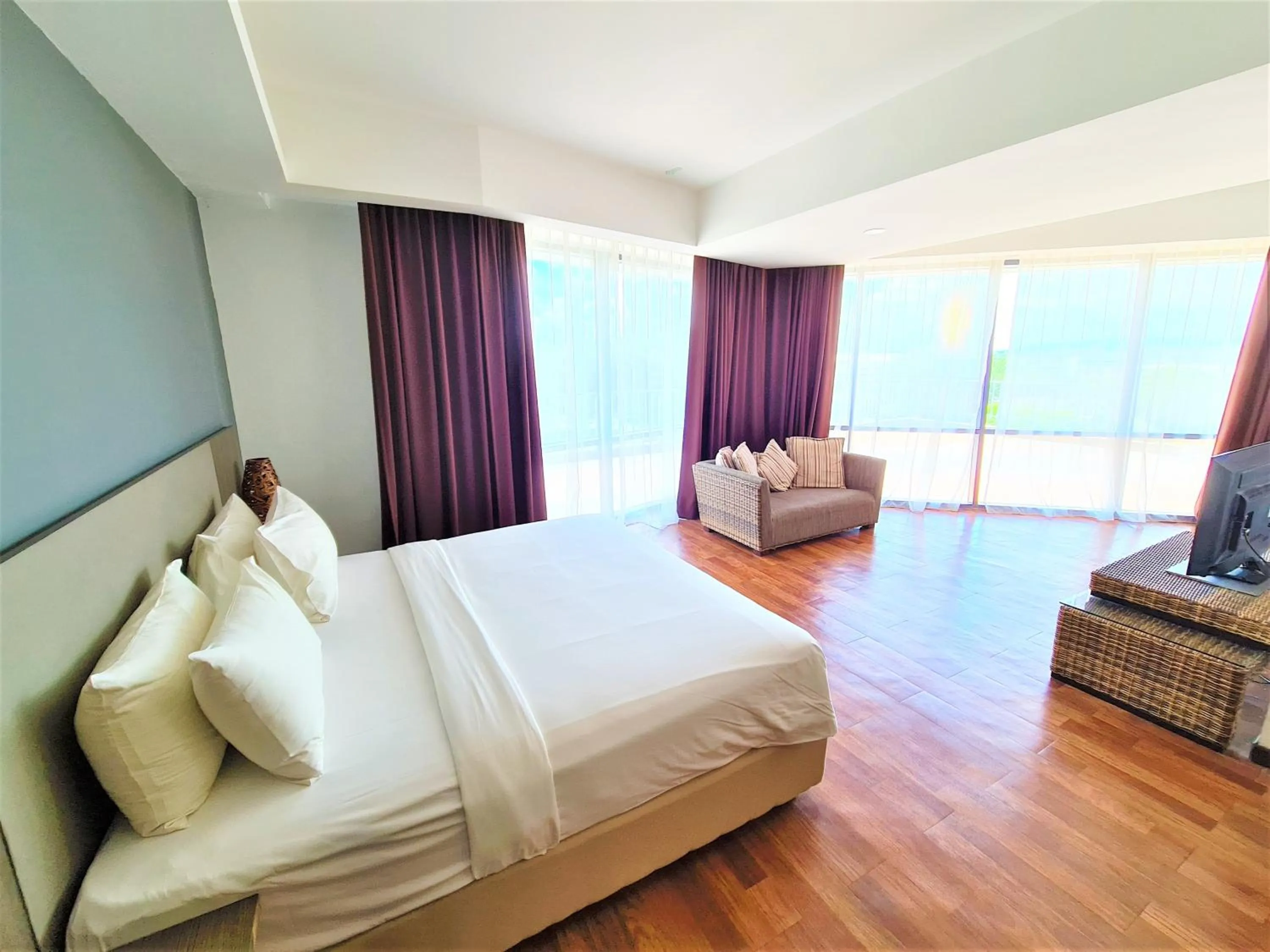 Bed in Nexus Business Suite Hotel