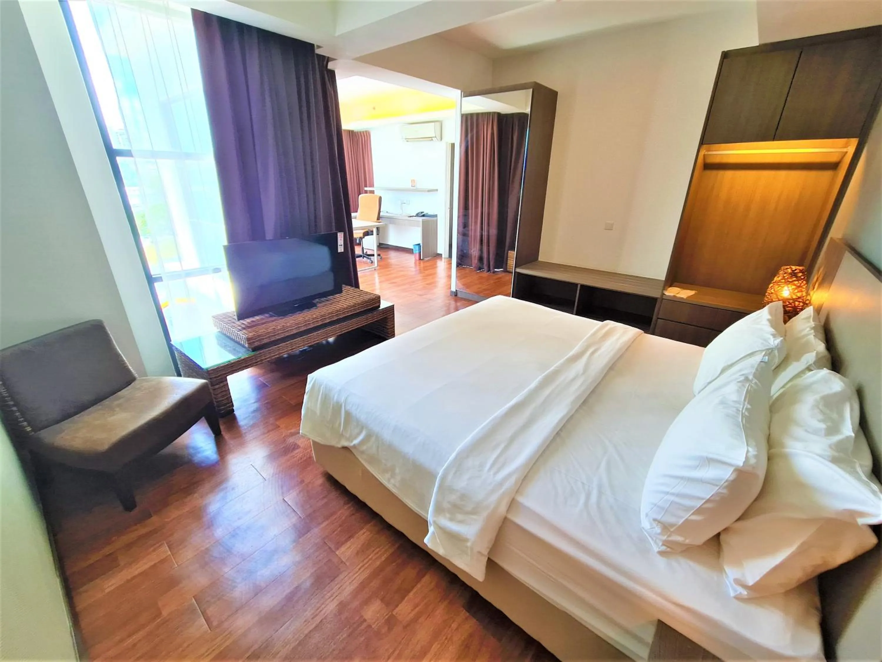 Living room, Bed in Nexus Business Suite Hotel