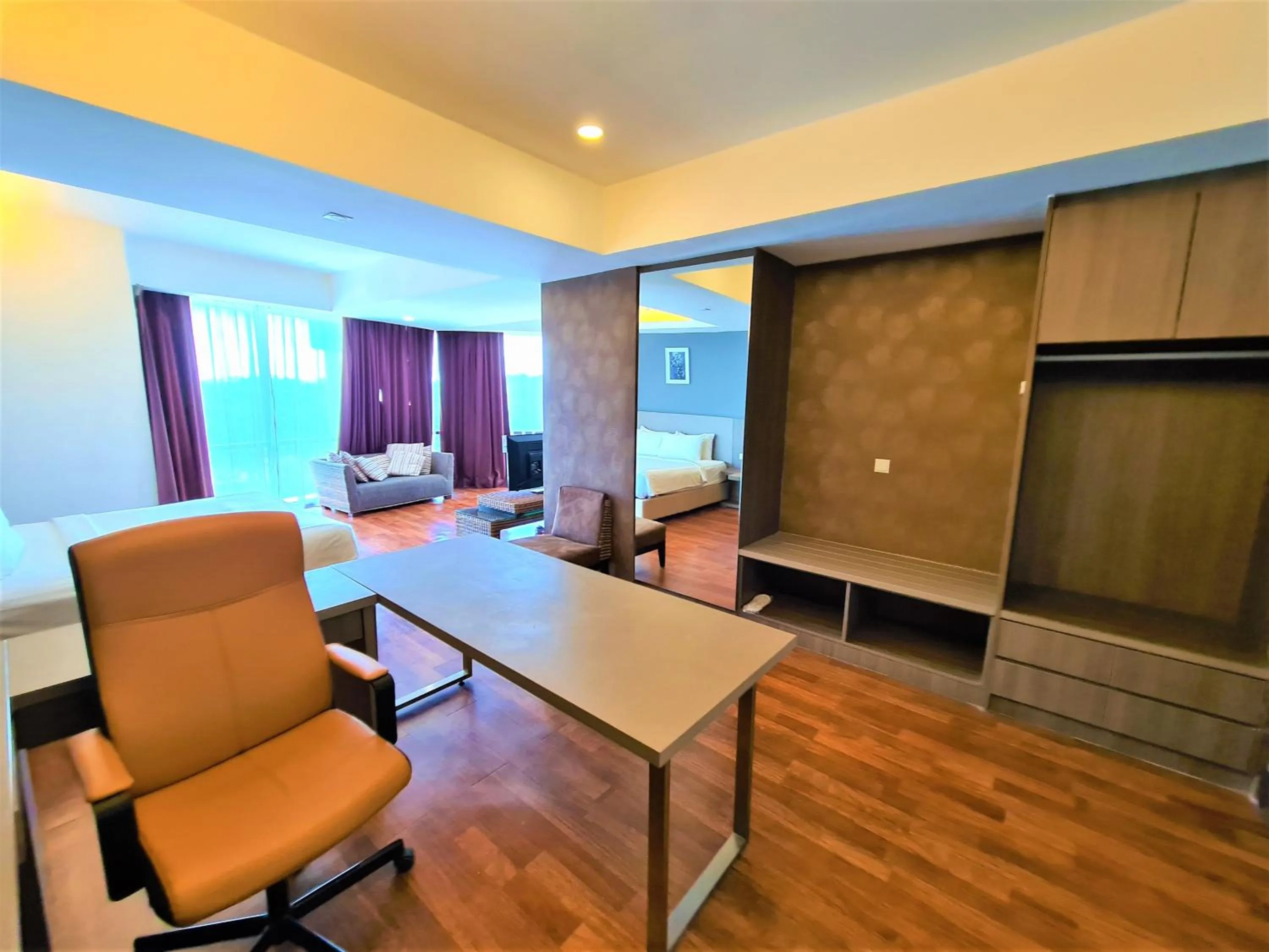 Seating area in Nexus Business Suite Hotel