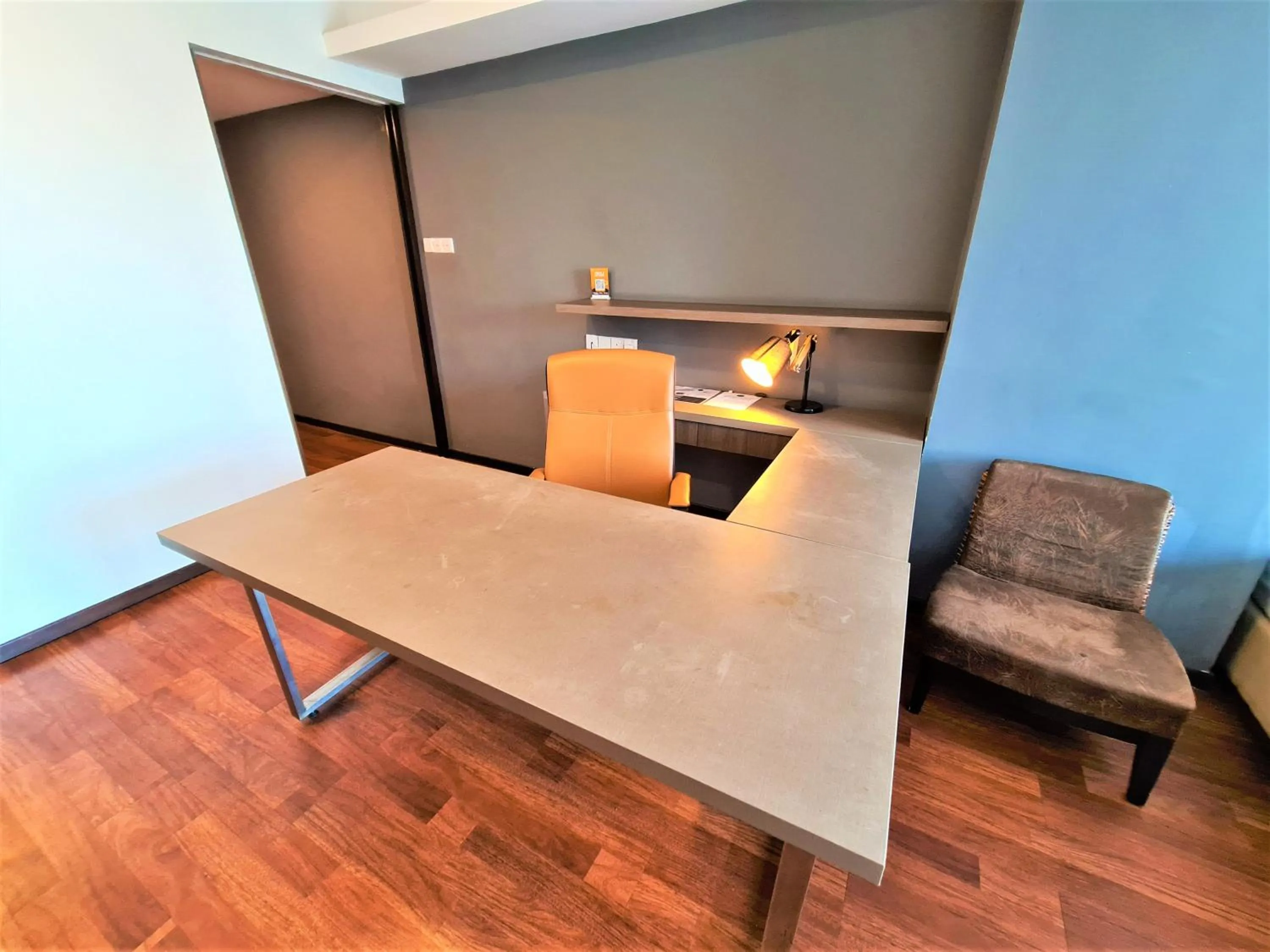 Seating area in Nexus Business Suite Hotel