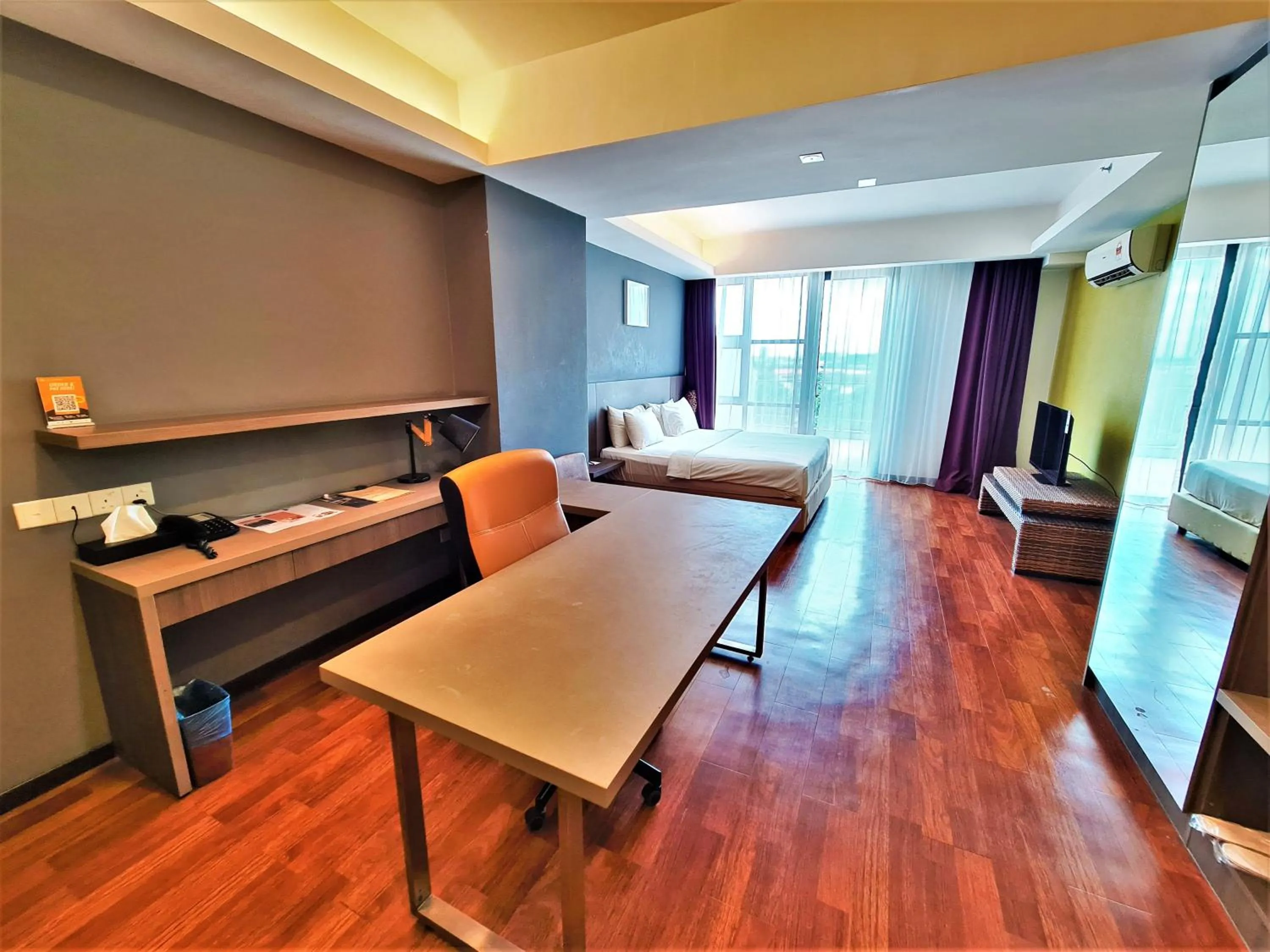 Seating area in Nexus Business Suite Hotel