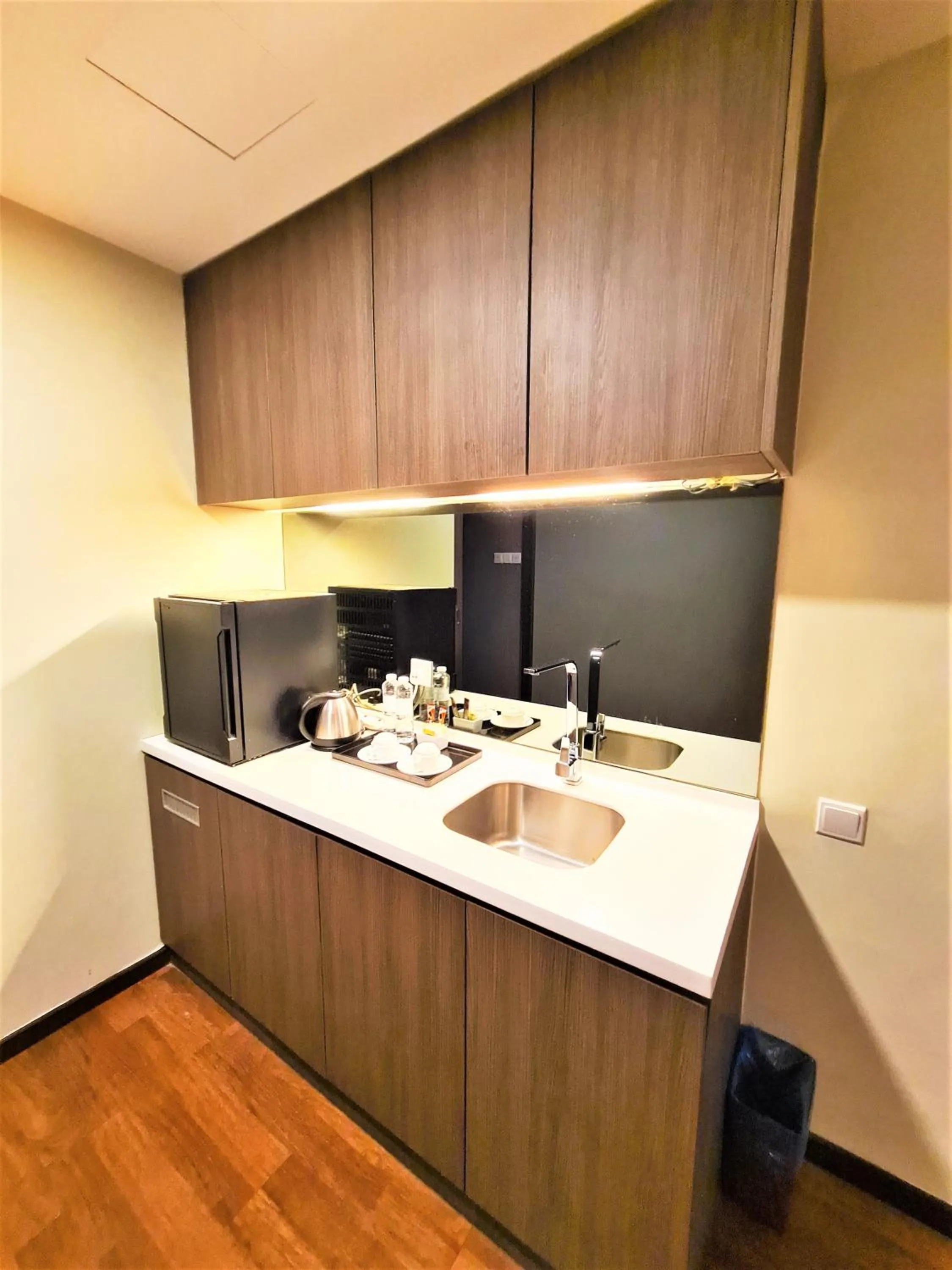 Kitchen or kitchenette in Nexus Business Suite Hotel