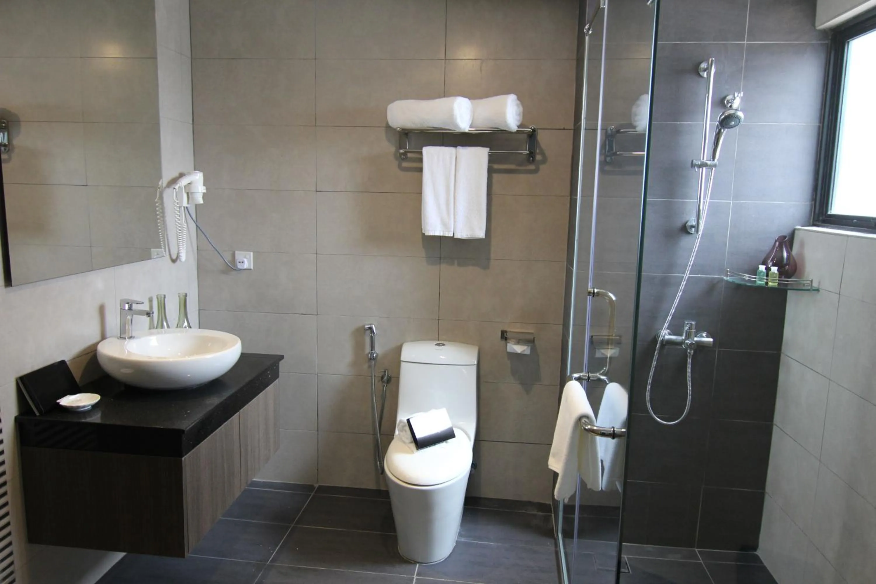 Bathroom in Nexus Business Suite Hotel