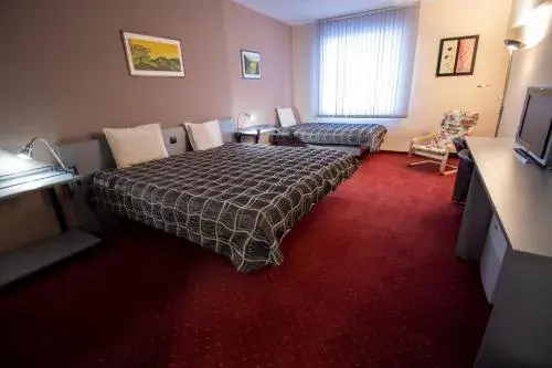Triple Room in ATM Hotel Triple Room in ATM Hotel