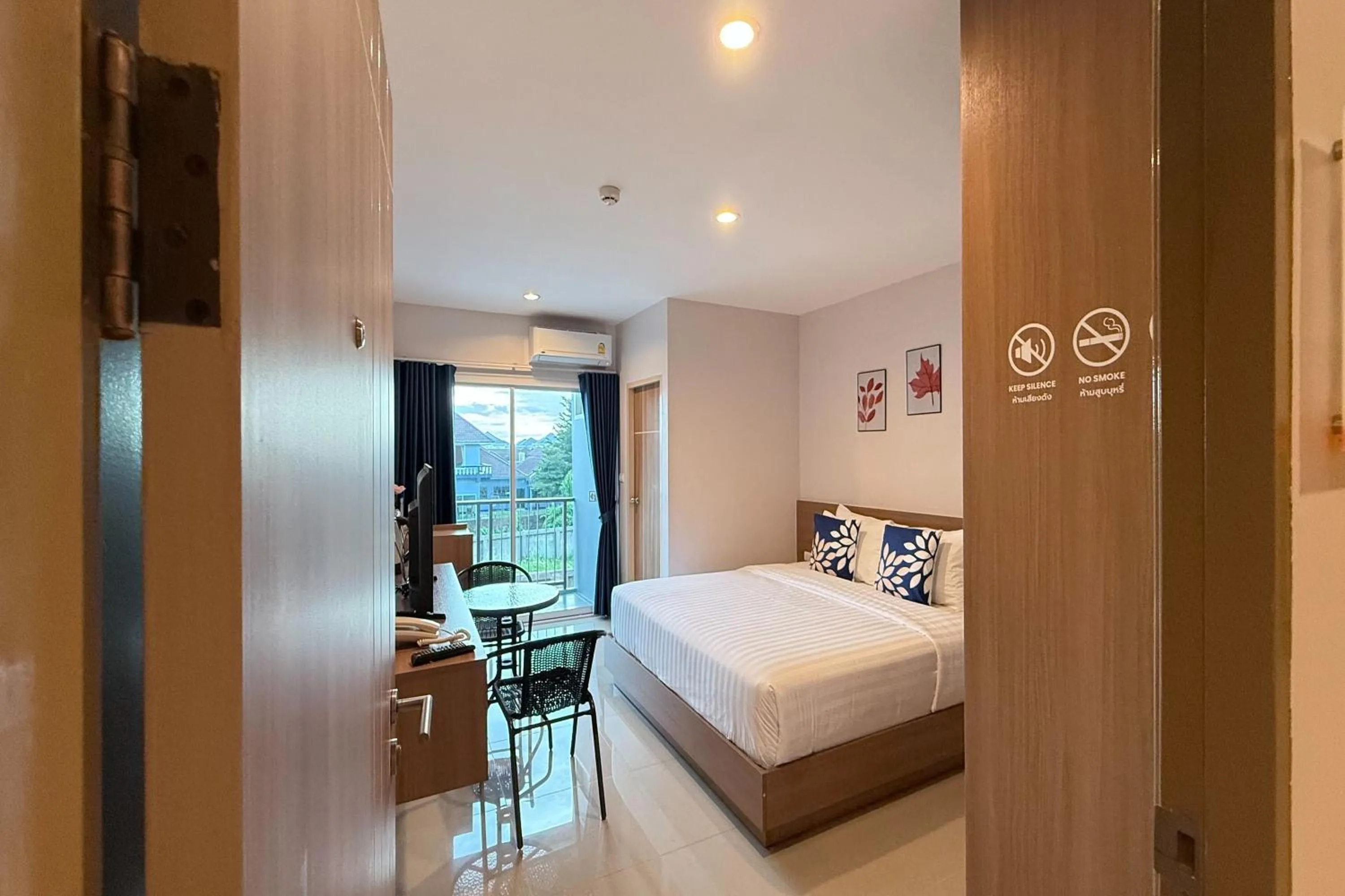 Photo of the whole room, Bed in SKM Paradise Mae Sai