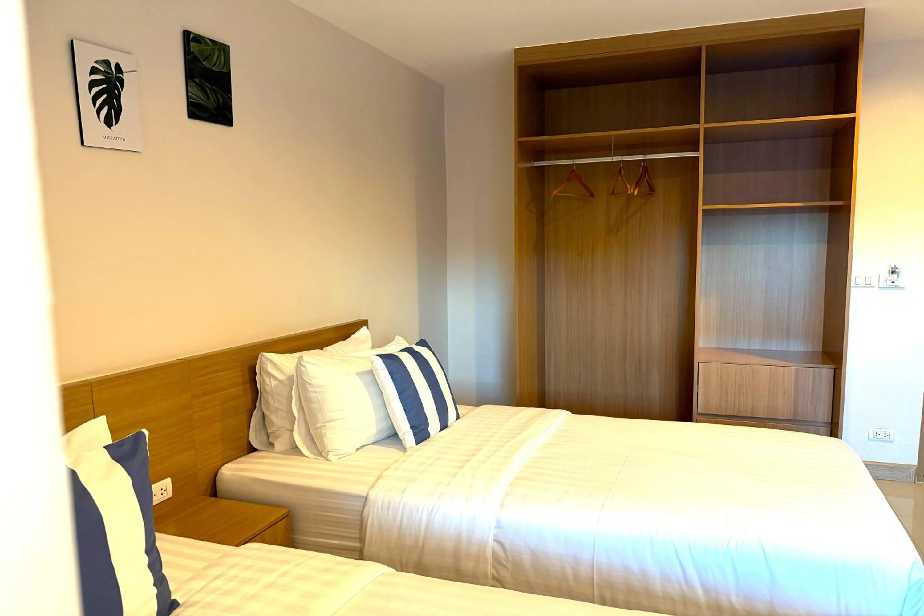 Photo of the whole room, Bed in SKM Paradise Mae Sai