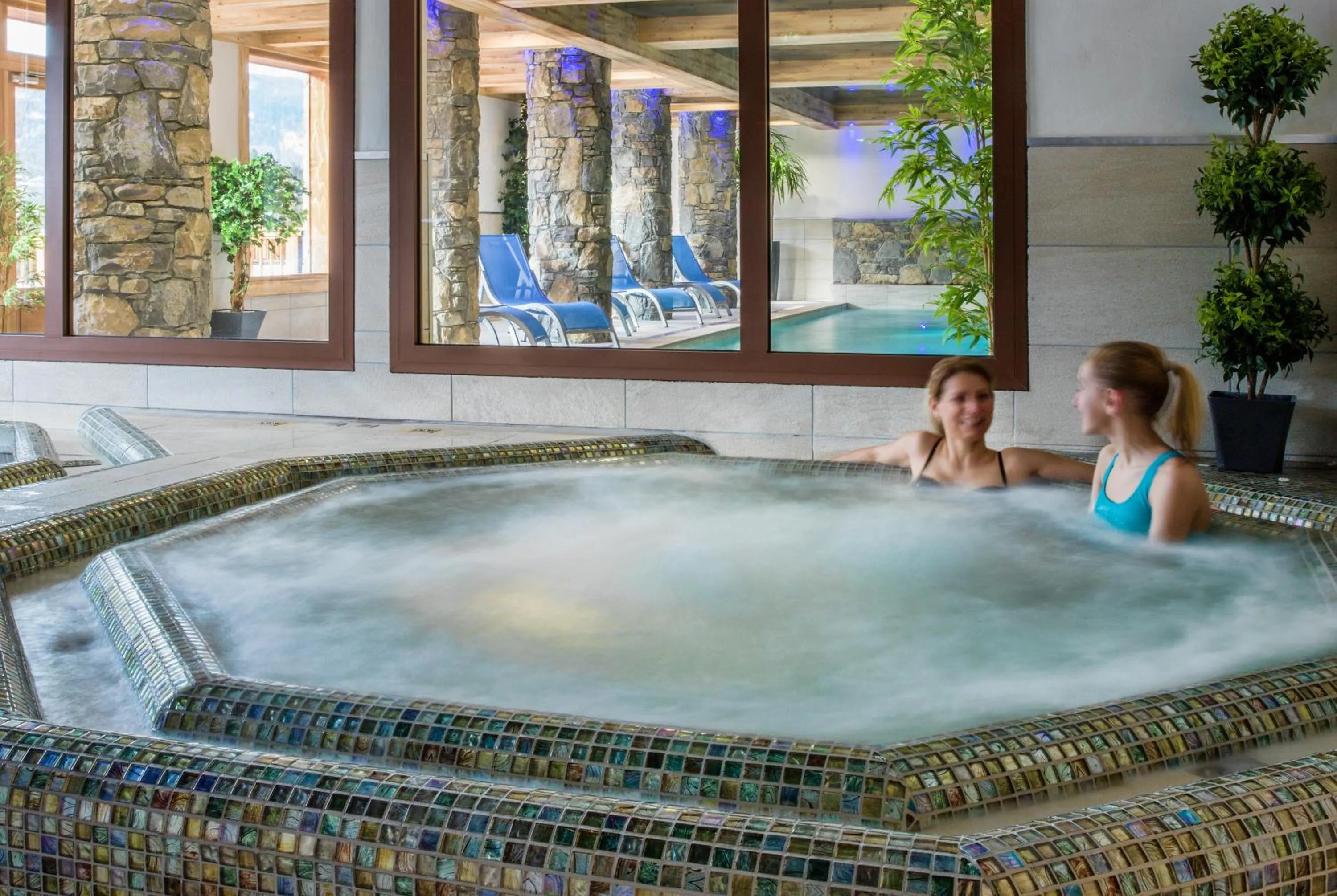 Hot Tub in CGH Résidence Boutique Les Chalets De Laÿssia