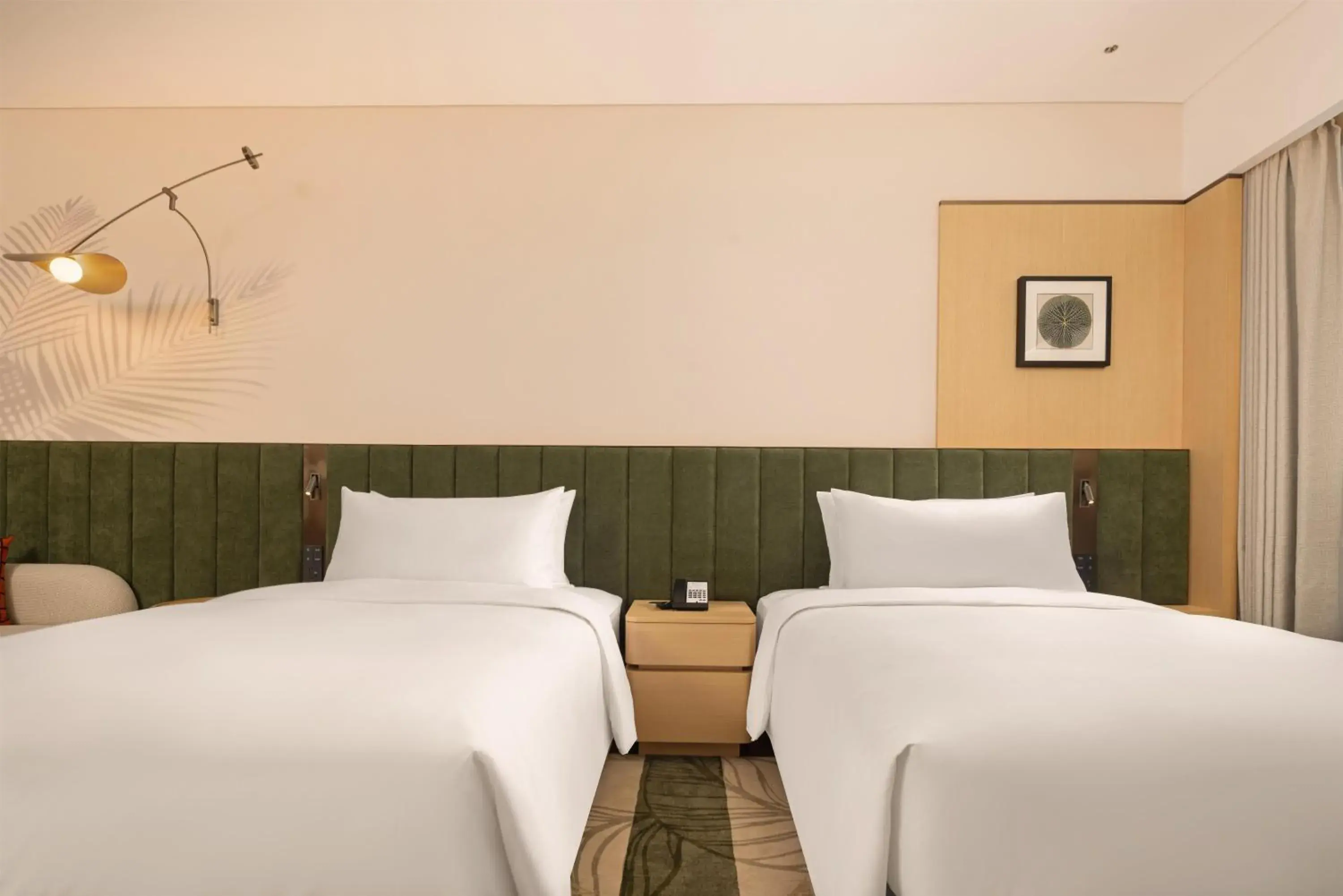 Twin Guest Room with Garden View in Hilton Garden Inn Xishuangbanna Gasa Airport Twin Guest Room with Garden View in Hilton Garden Inn Xishuangbanna Gasa Airport