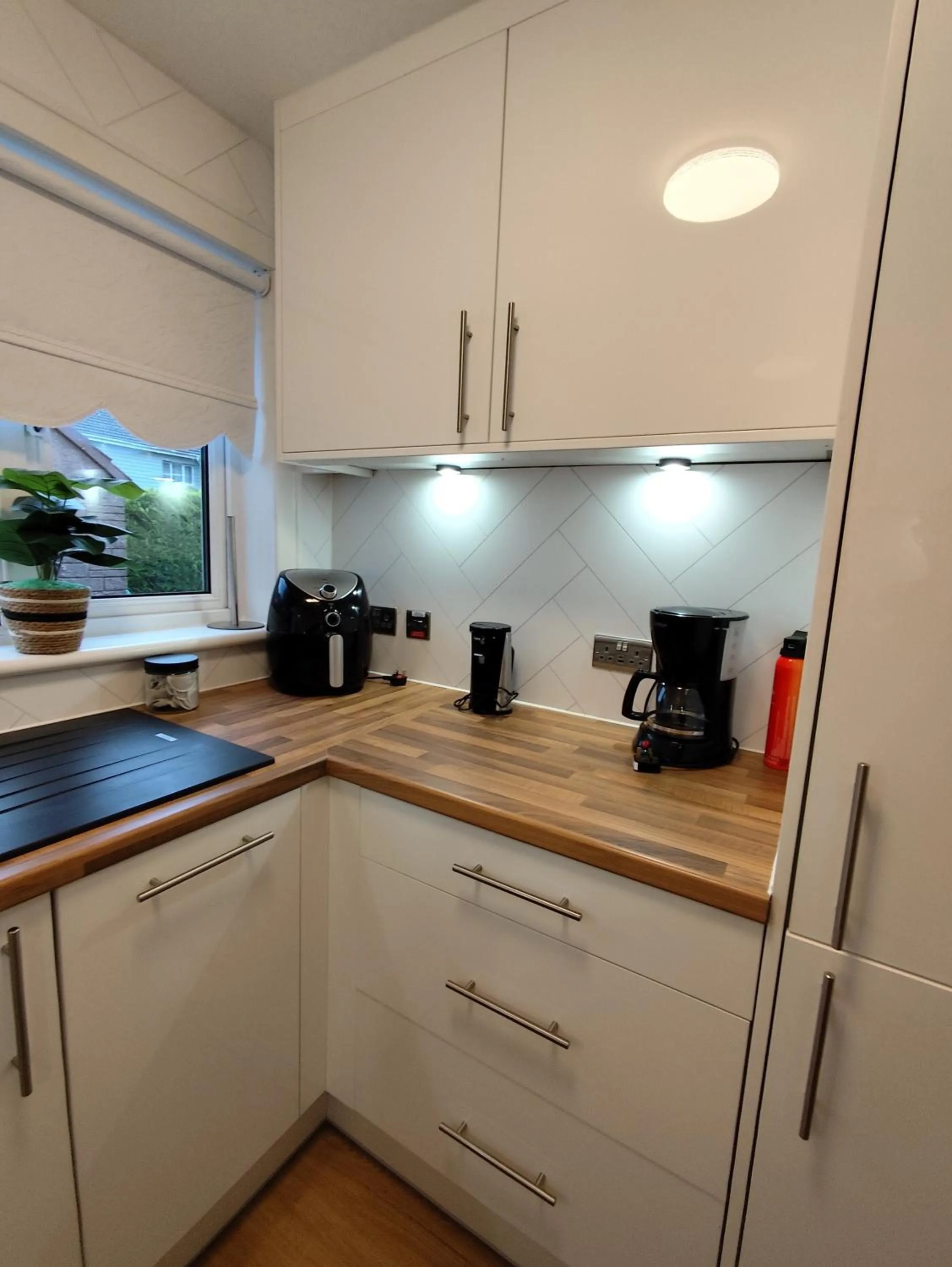 Kitchen or kitchenette in The Old Smiddy Cottage and Apartment