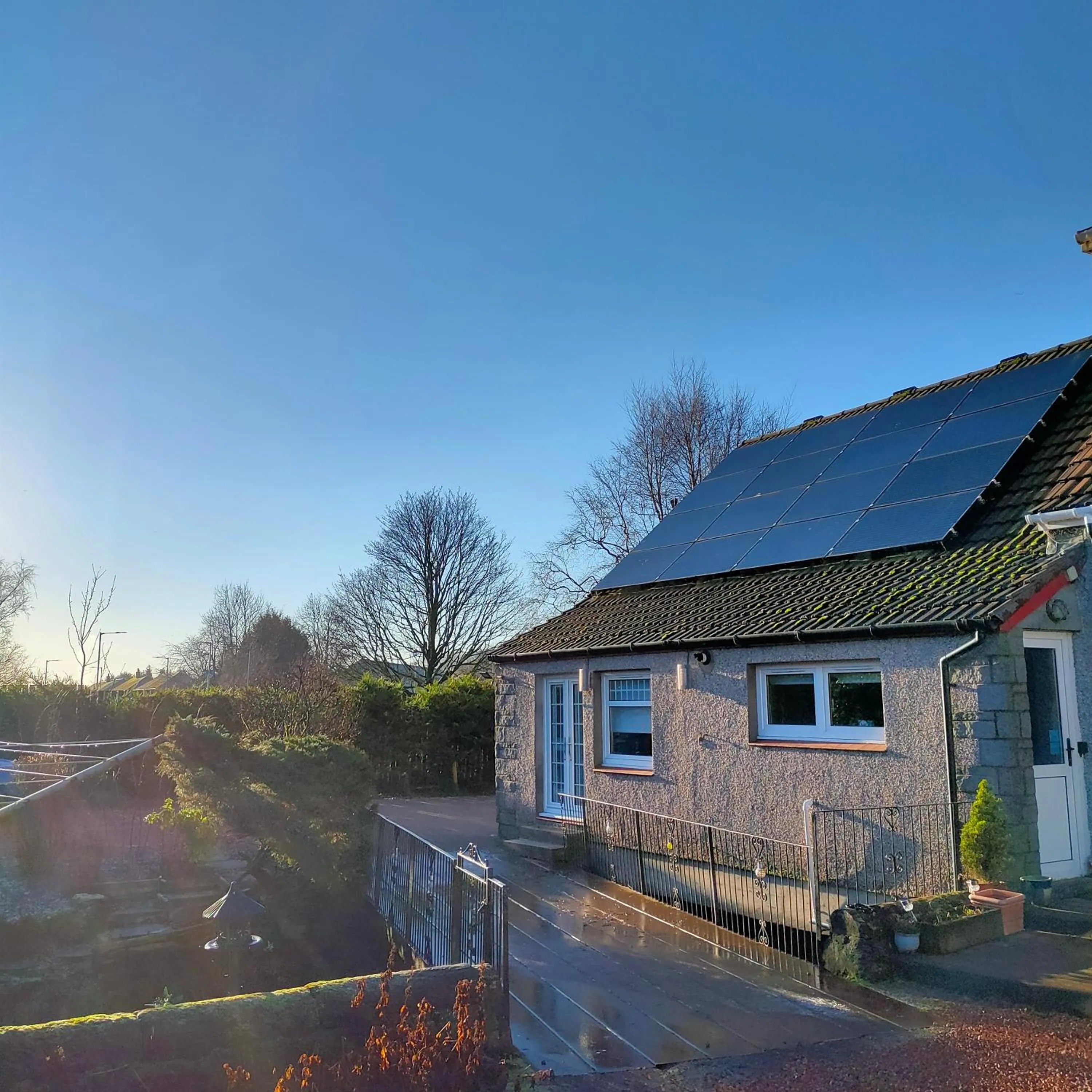 Property building in The Old Smiddy Cottage and Apartment