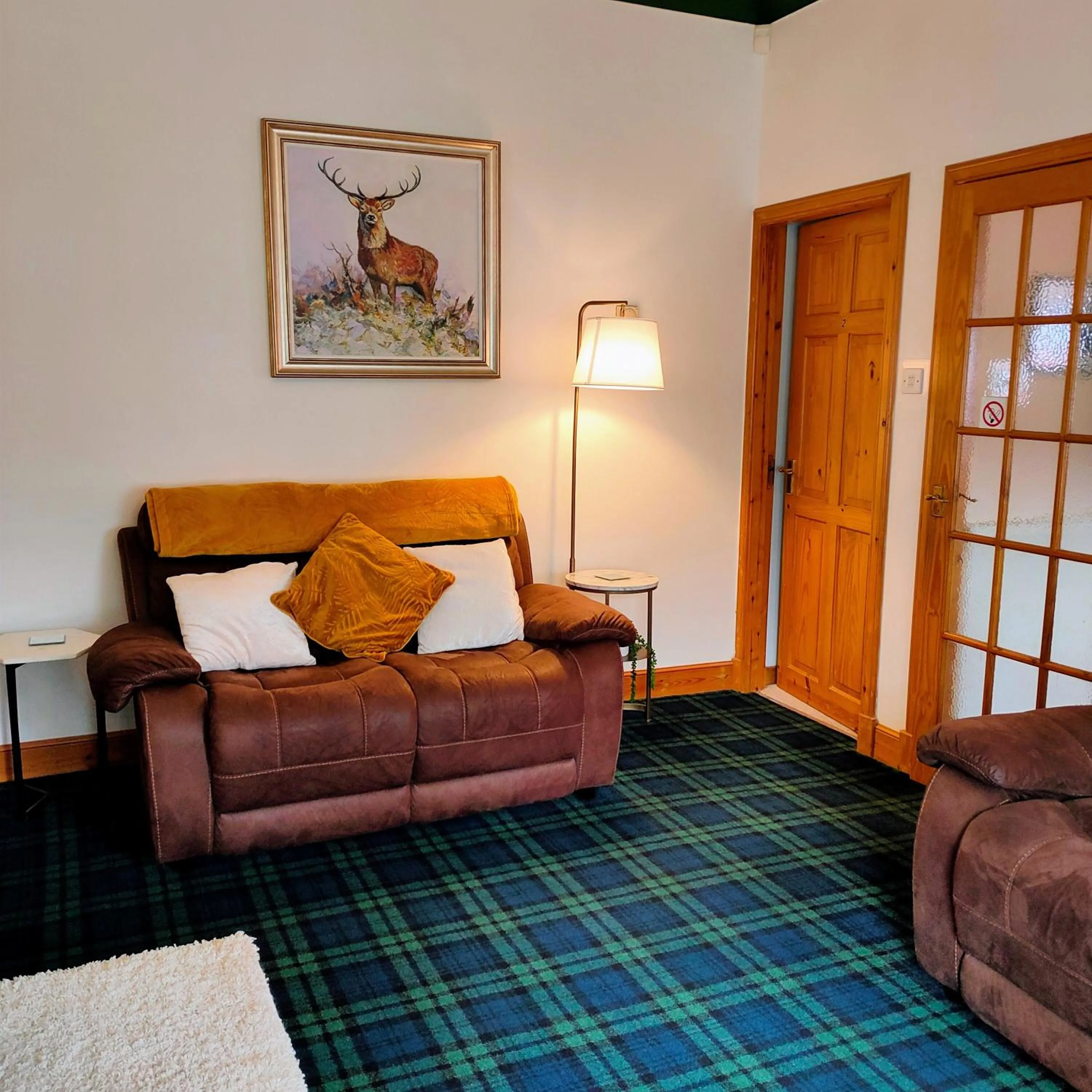 Living room in The Old Smiddy Cottage and Apartment