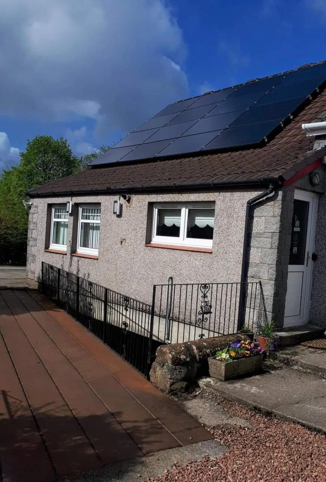 Property building in The Old Smiddy Cottage and Apartment