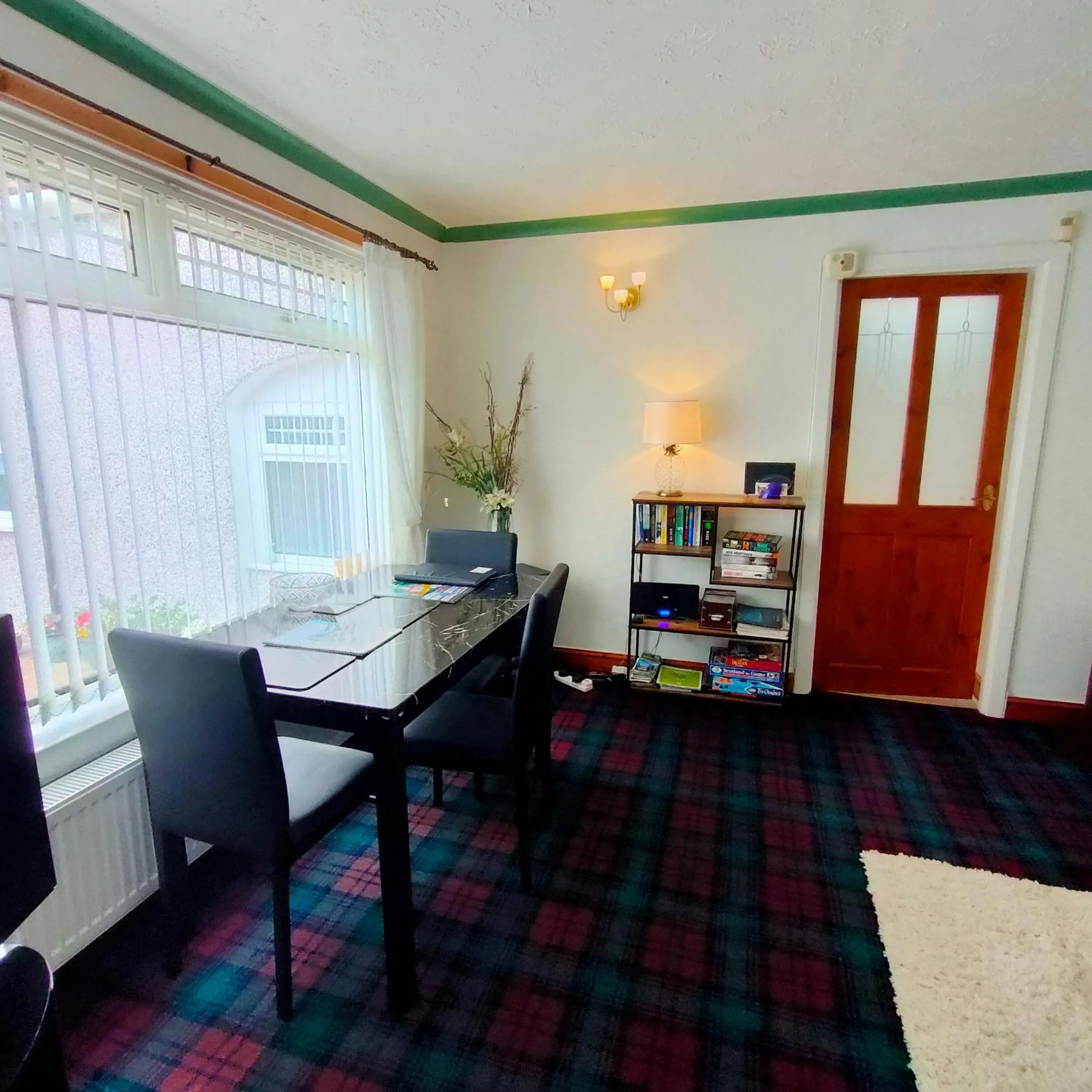 Seating area in The Old Smiddy Cottage and Apartment