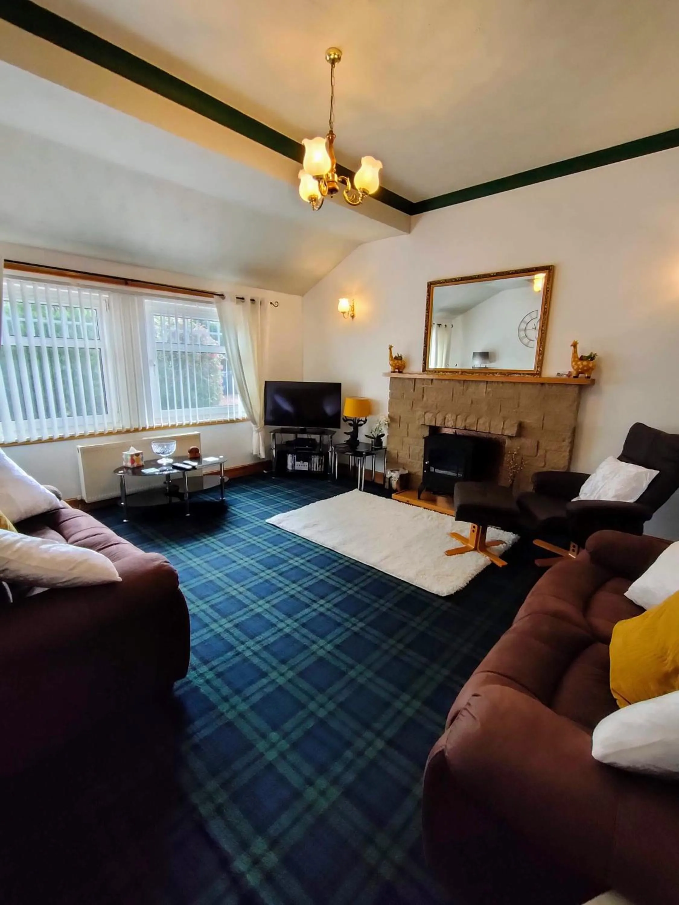 Living room in The Old Smiddy Cottage and Apartment