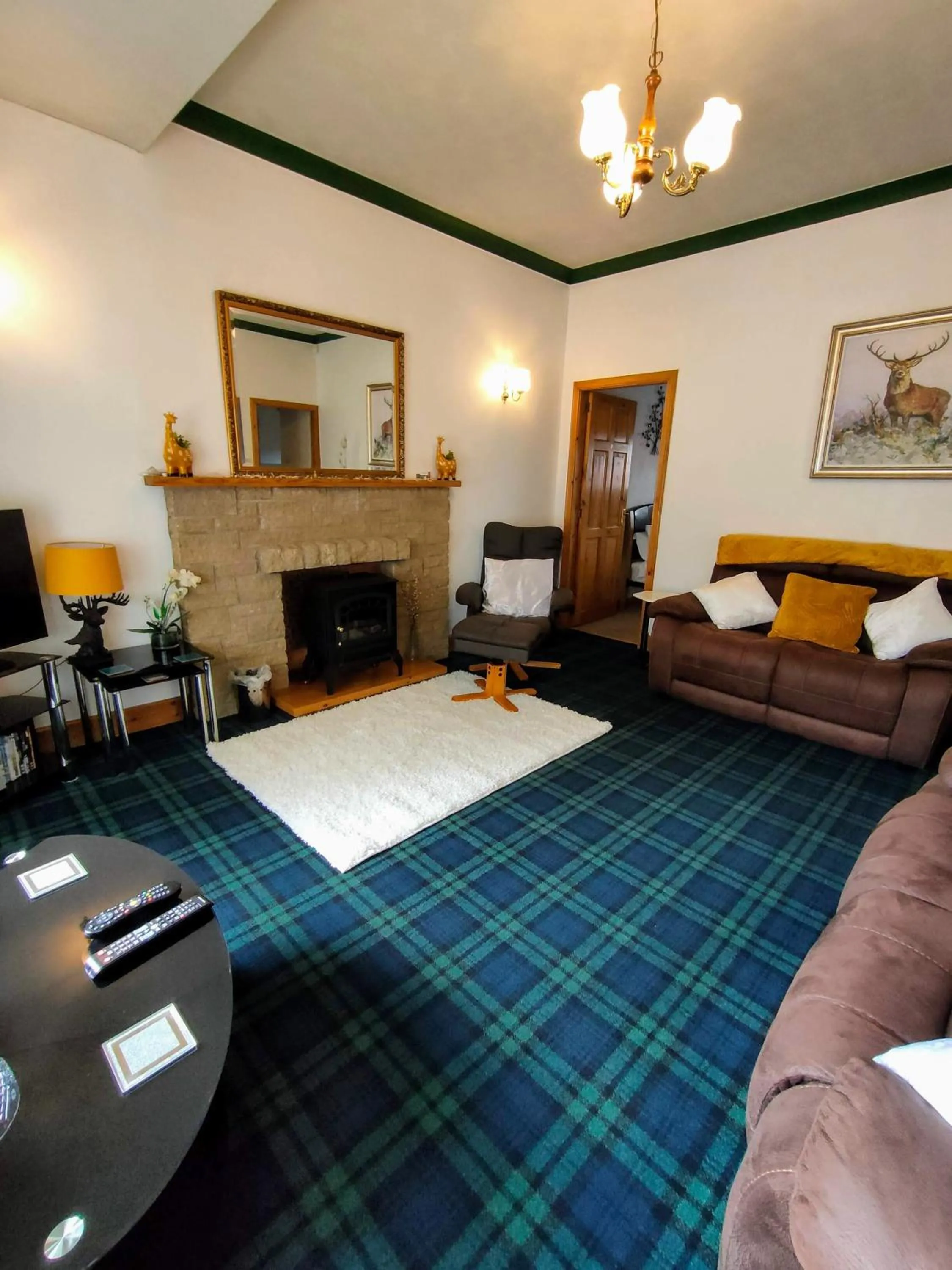 Seating area in The Old Smiddy Cottage and Apartment