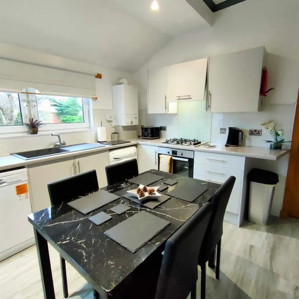 Kitchen or kitchenette in The Old Smiddy Cottage and Apartment