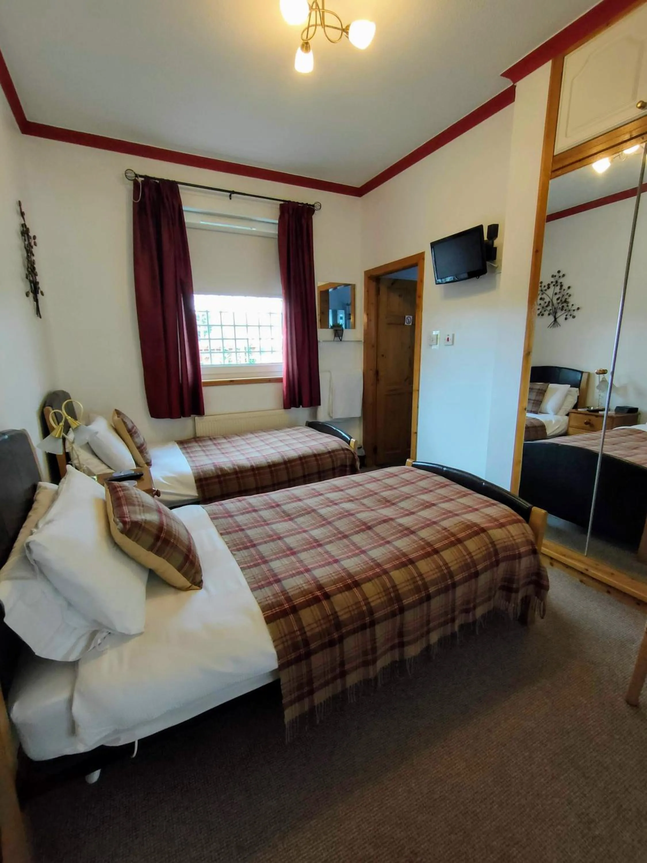 Bedroom, Bed in The Old Smiddy Cottage and Apartment