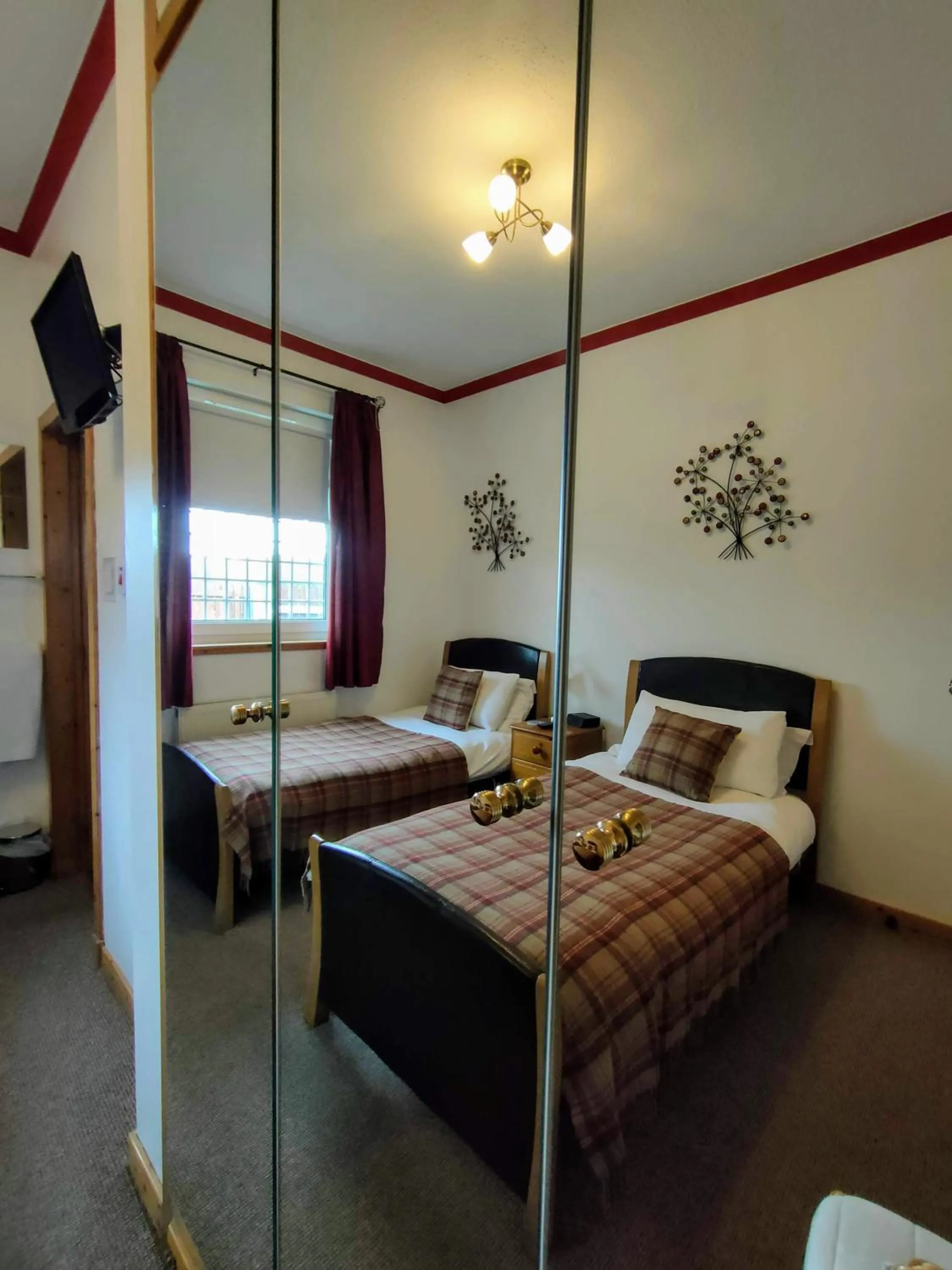 Bedroom, Bed in The Old Smiddy Cottage and Apartment