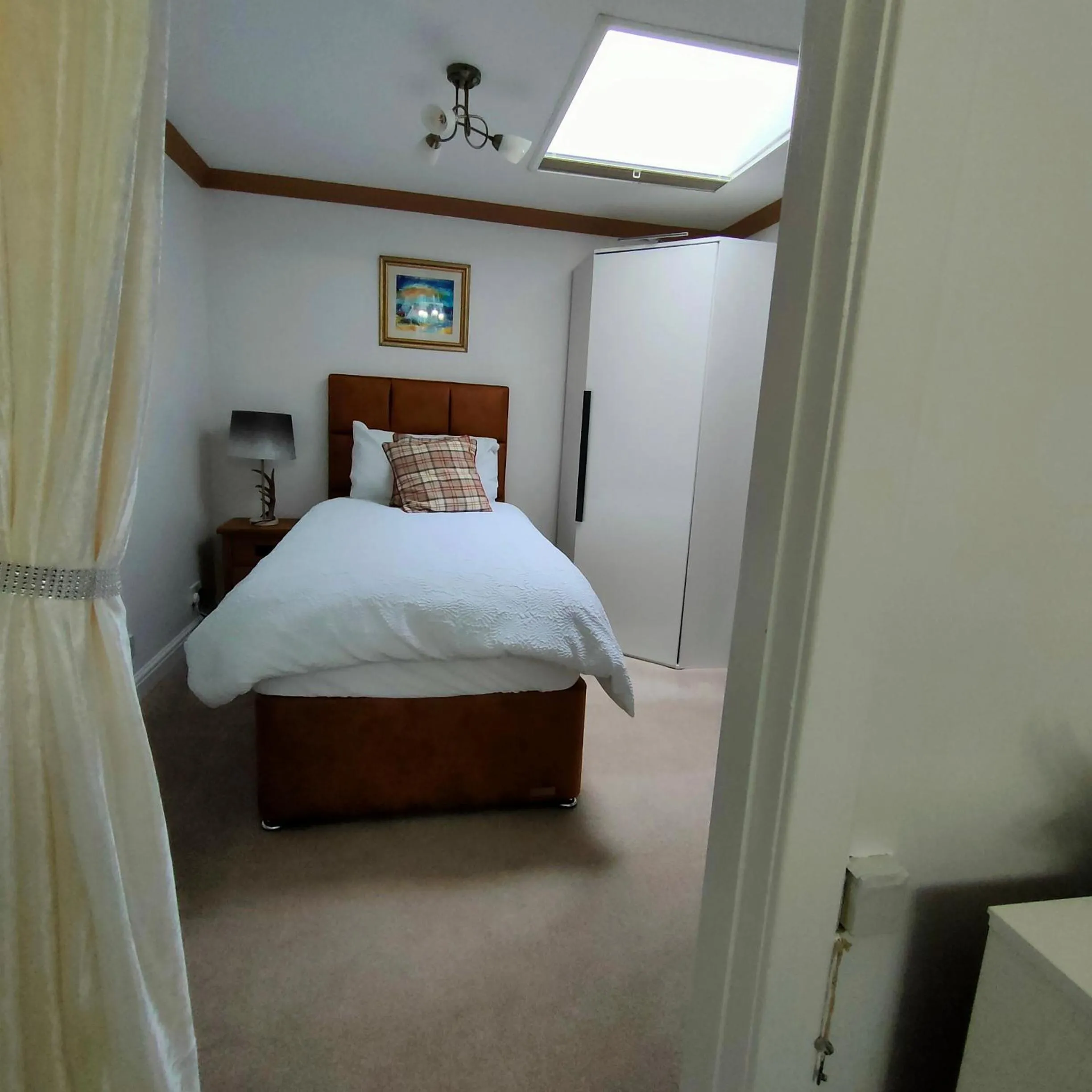 Bedroom, Bed in The Old Smiddy Cottage and Apartment